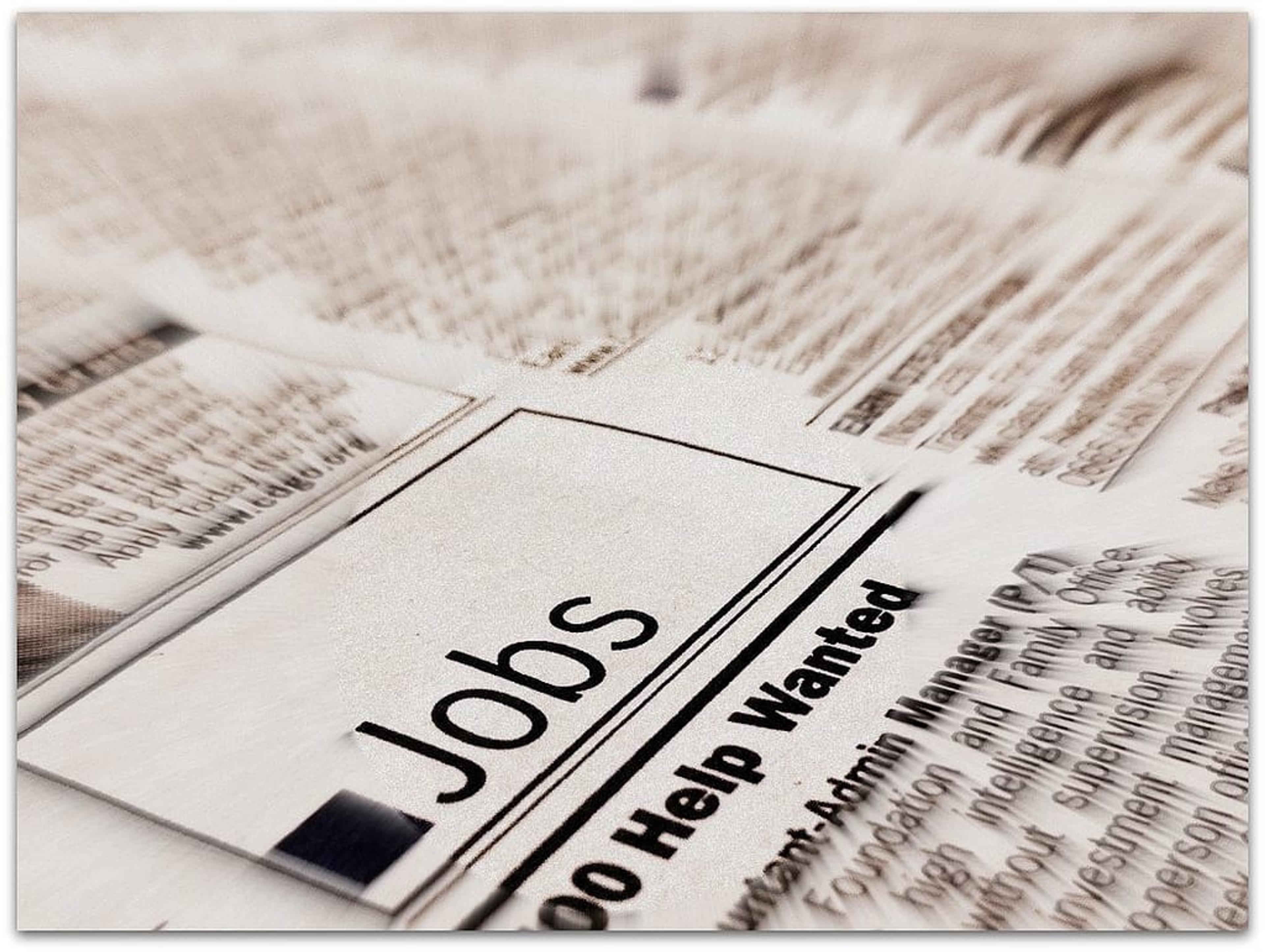 Black-and-white image of a "Help Wanted" ad in the "Jobs" section of a newspaper.