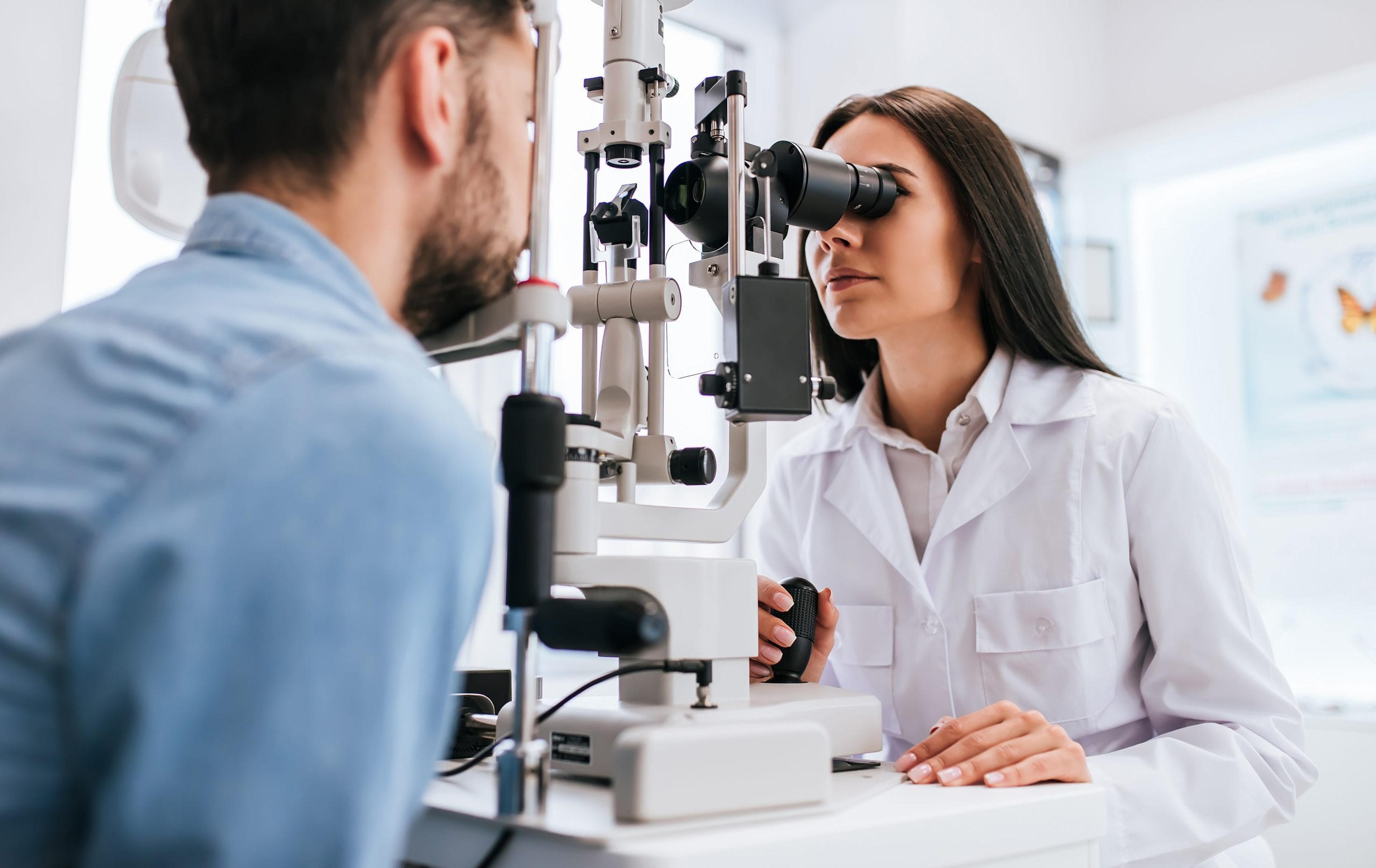 Eye doctor performing an eye exam