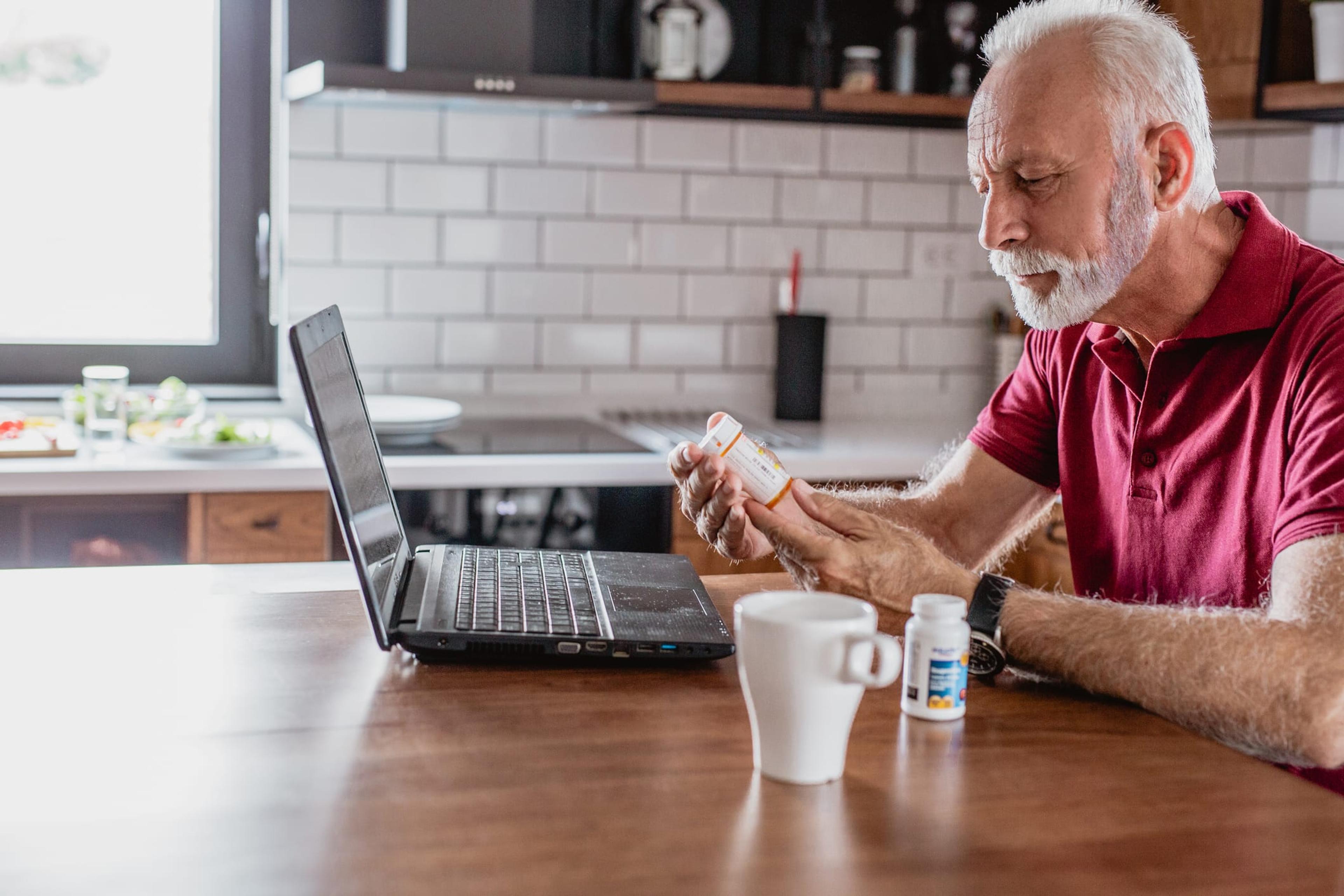 Man managing prescriptions