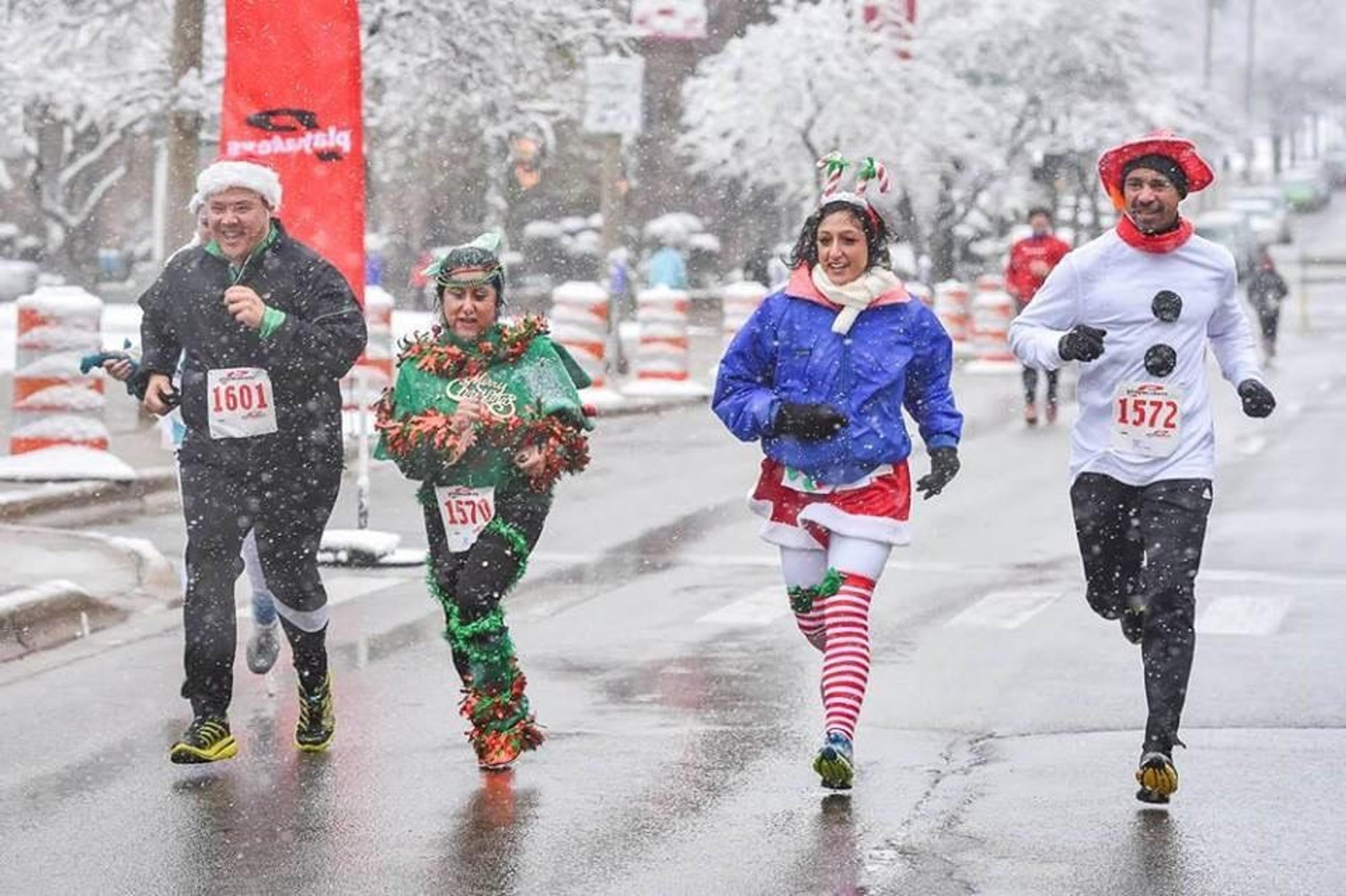 Runners wearing holiday-themed costumes take part in last year's Silver Bells 5K Run.