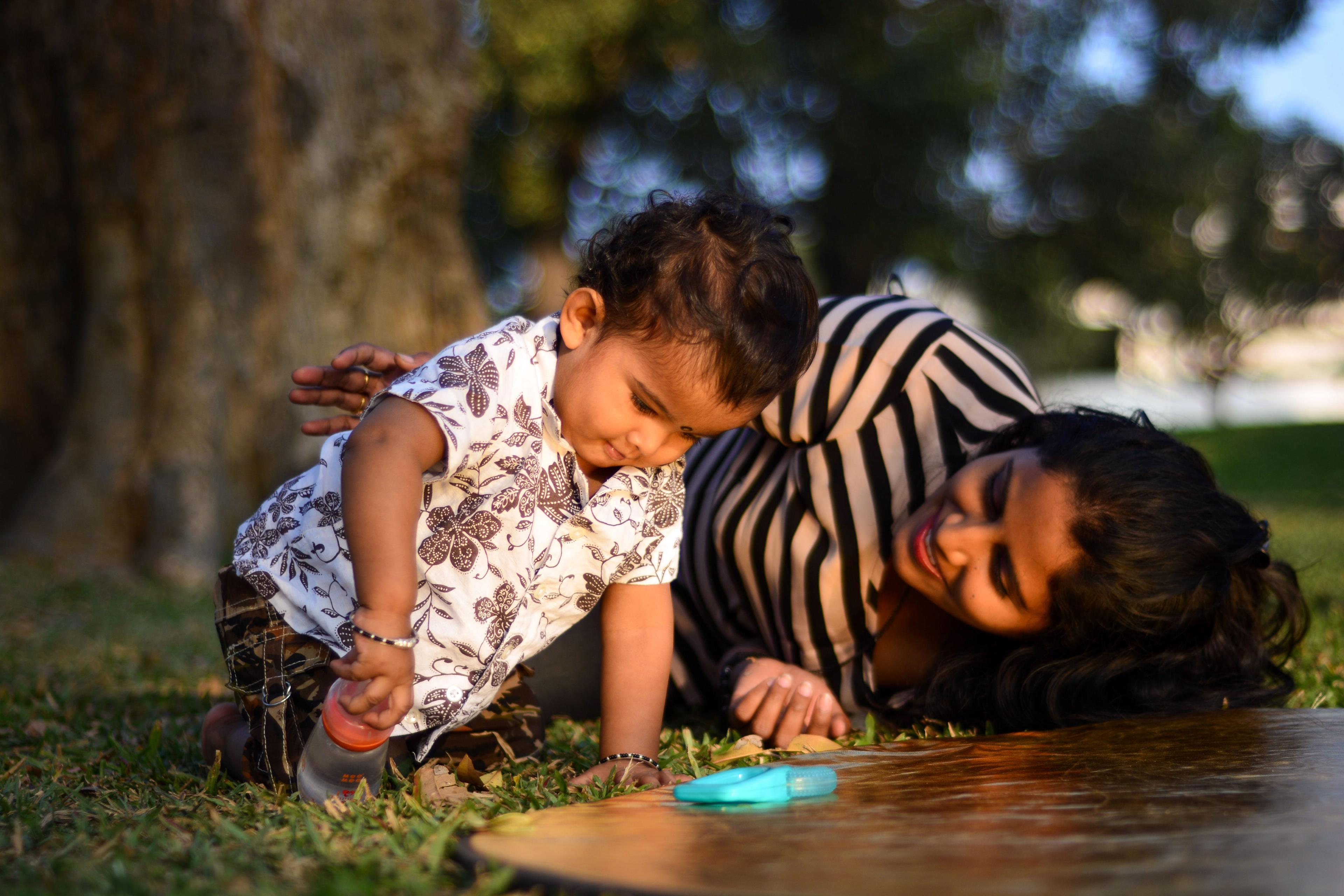 A mother and son playing