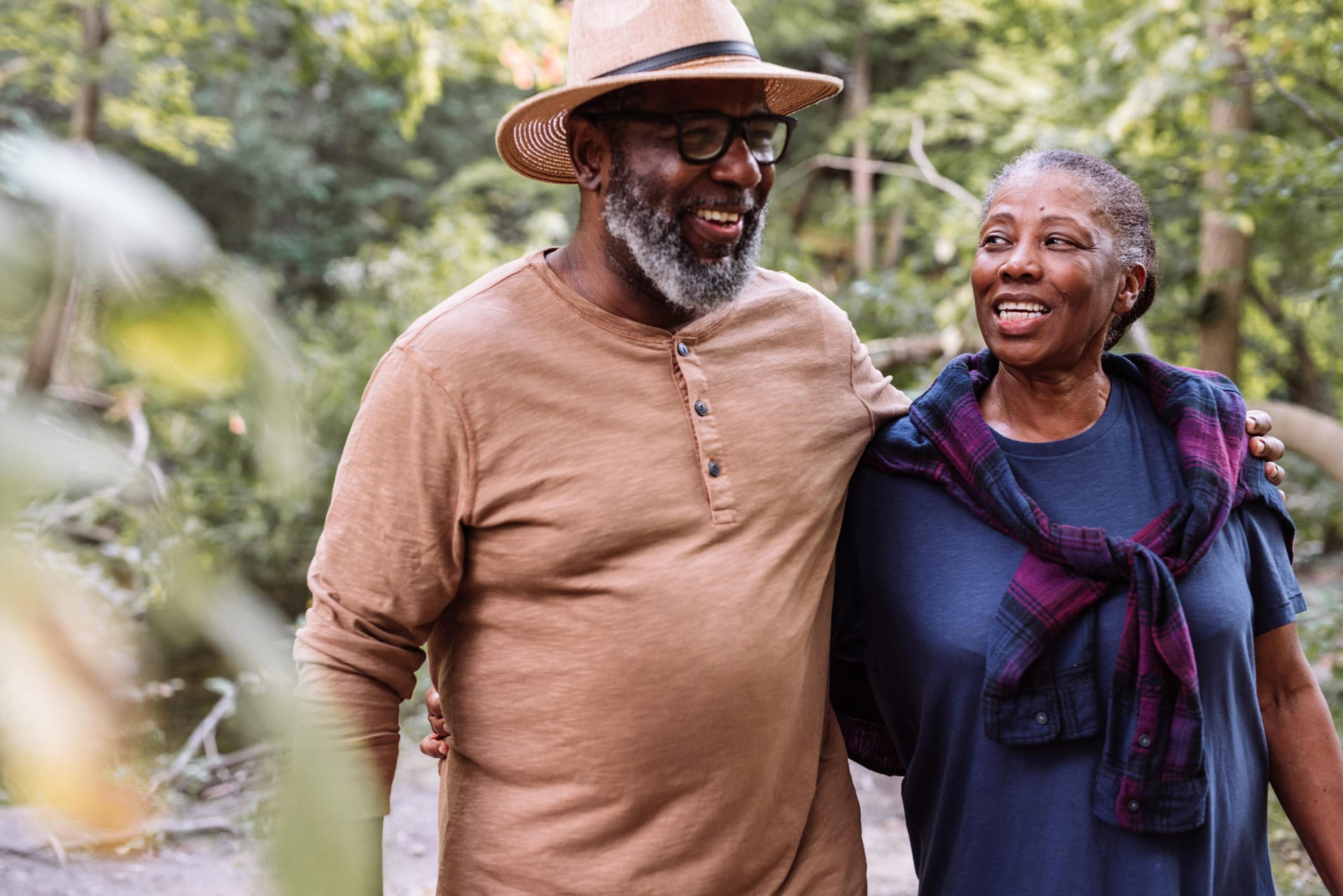 Smiling seniors couple on the walk