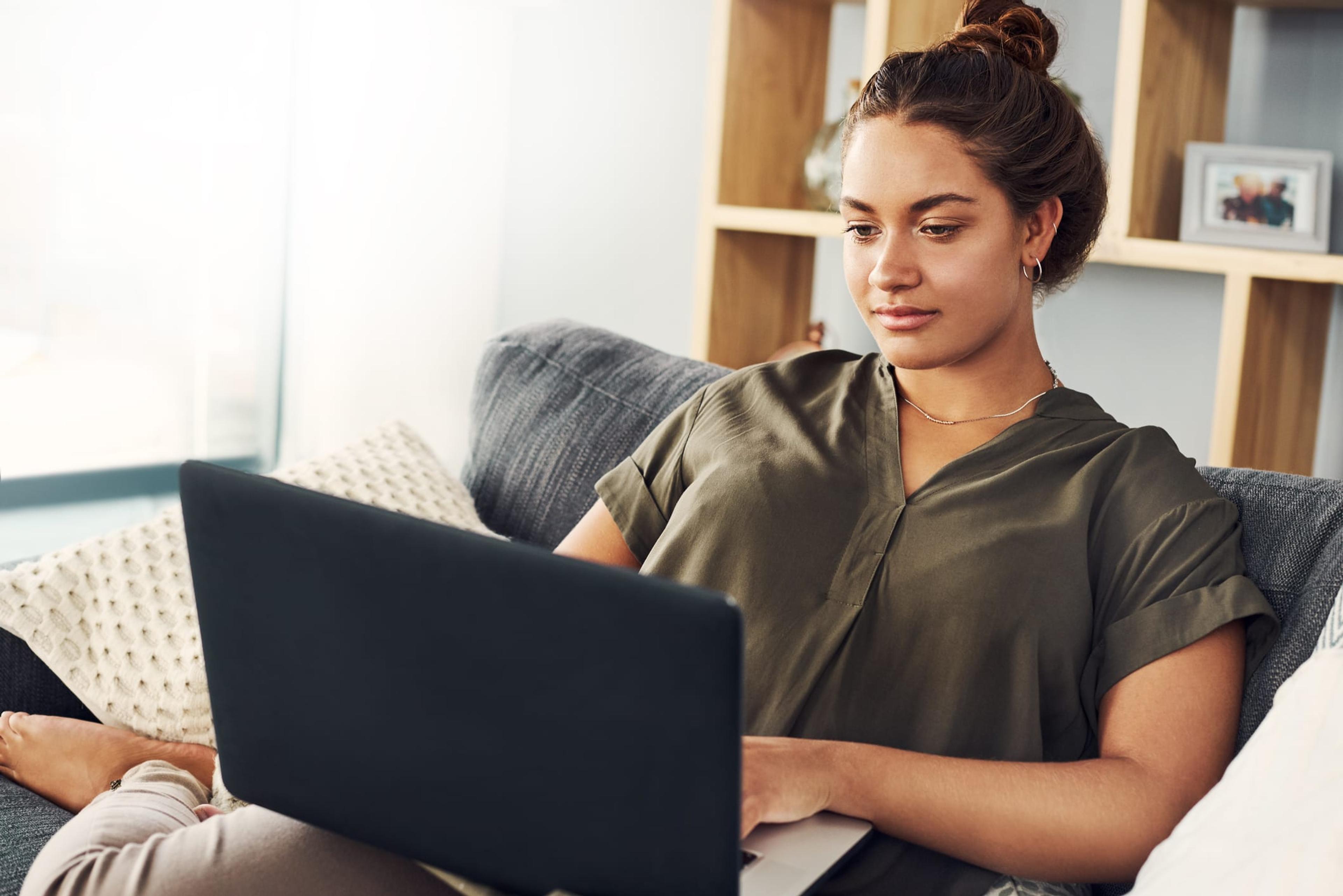 Young woman working on her laptop