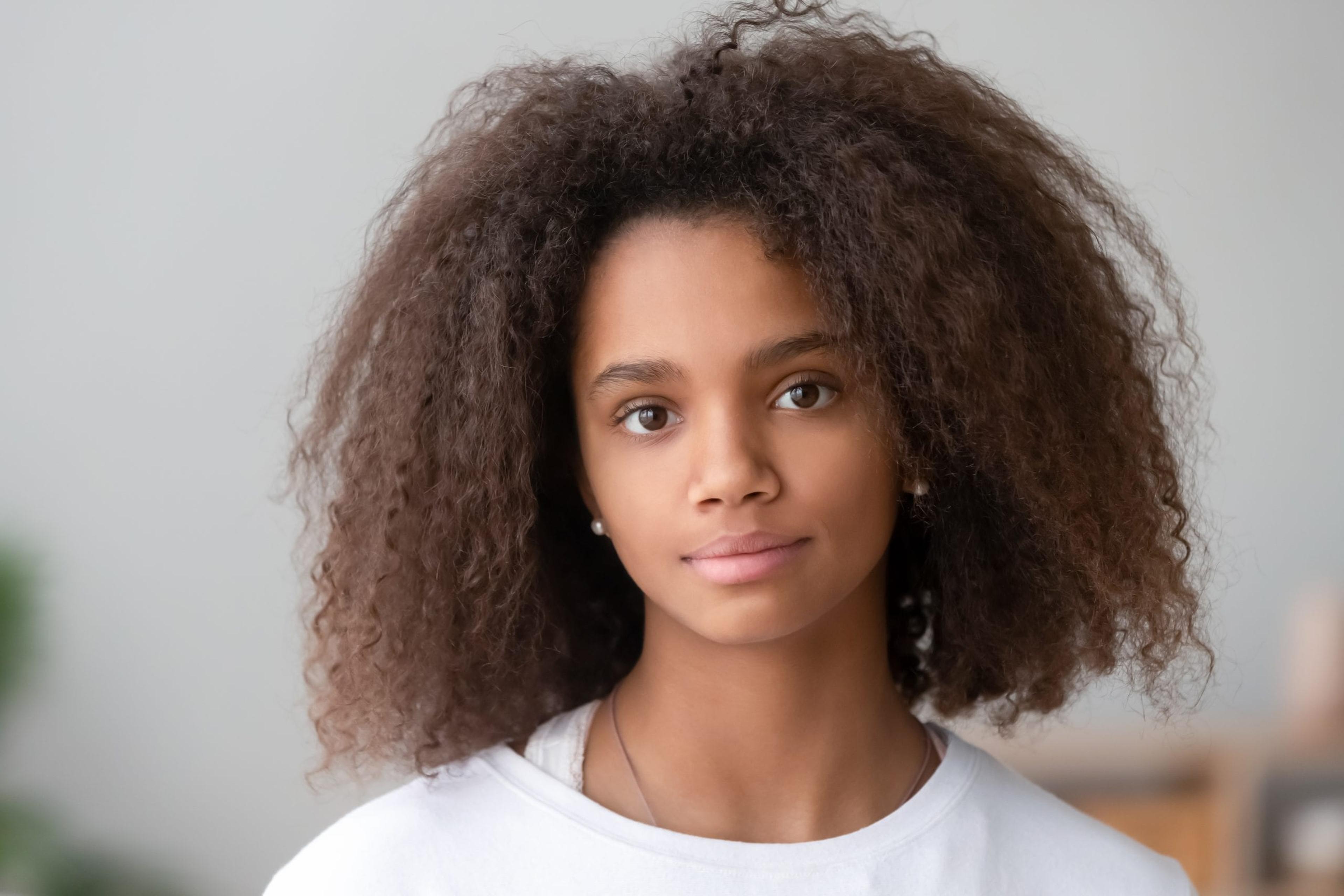 Young girl looking at camera