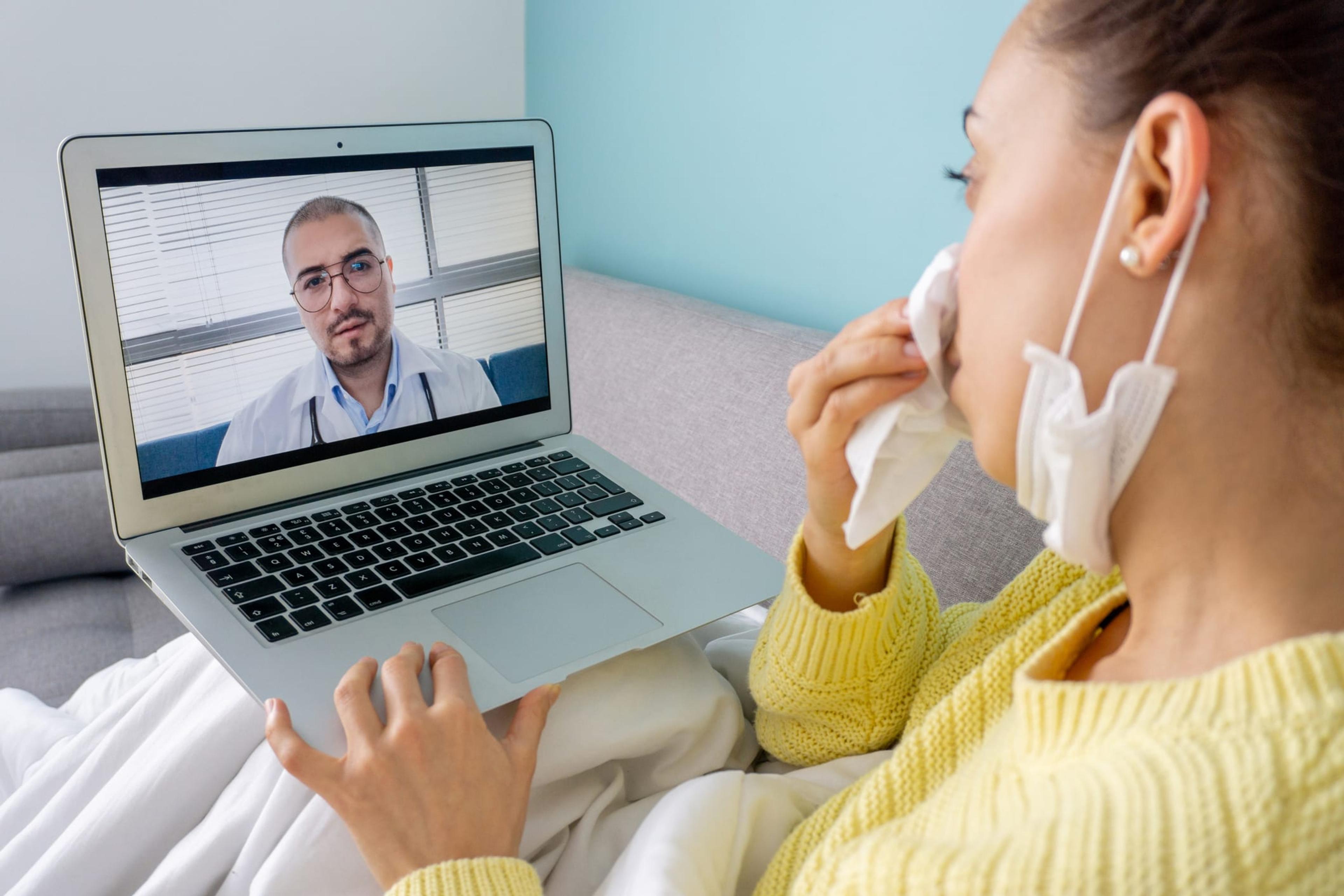 Woman speaking with doctor