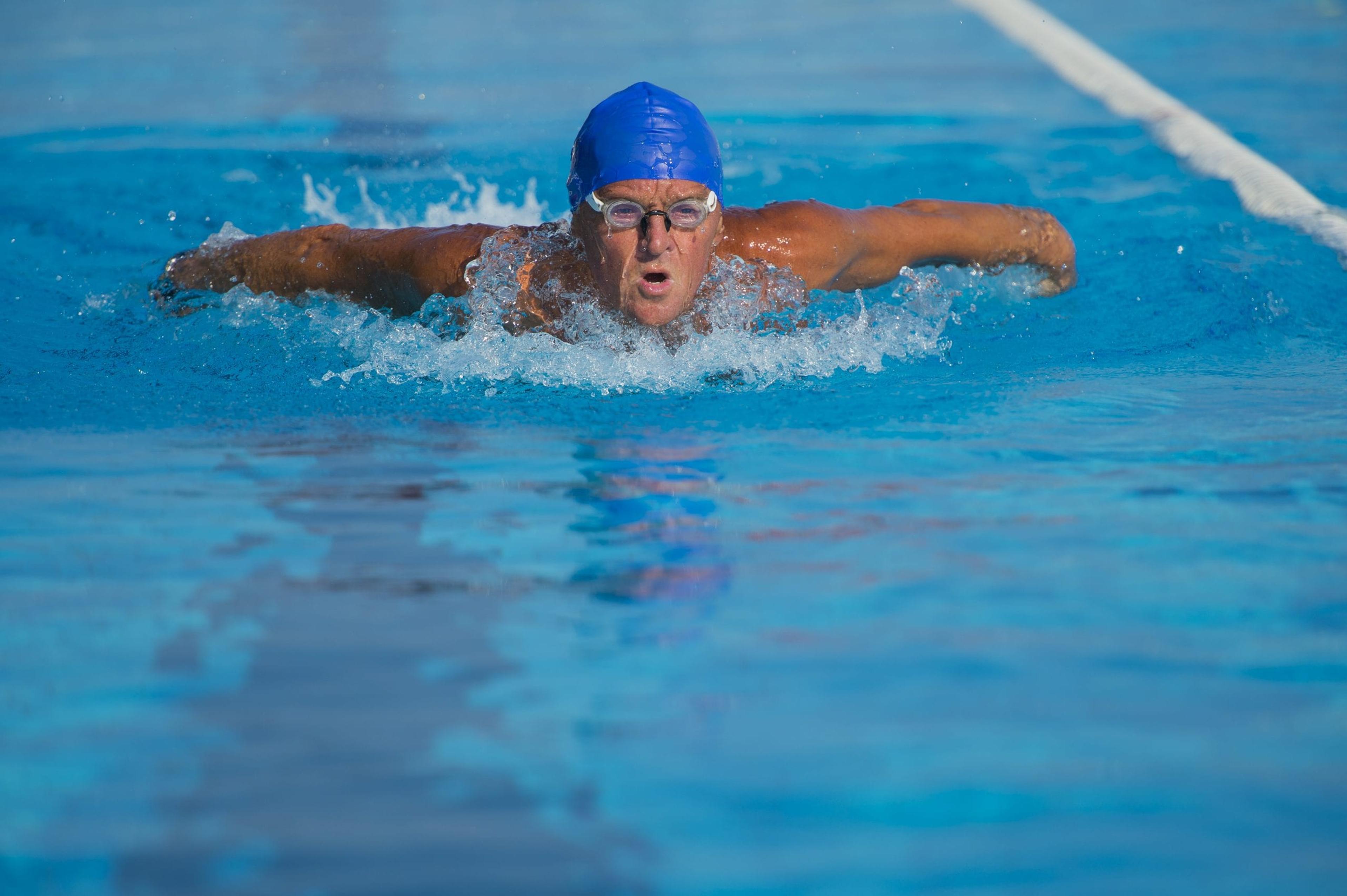 Senior man swimming