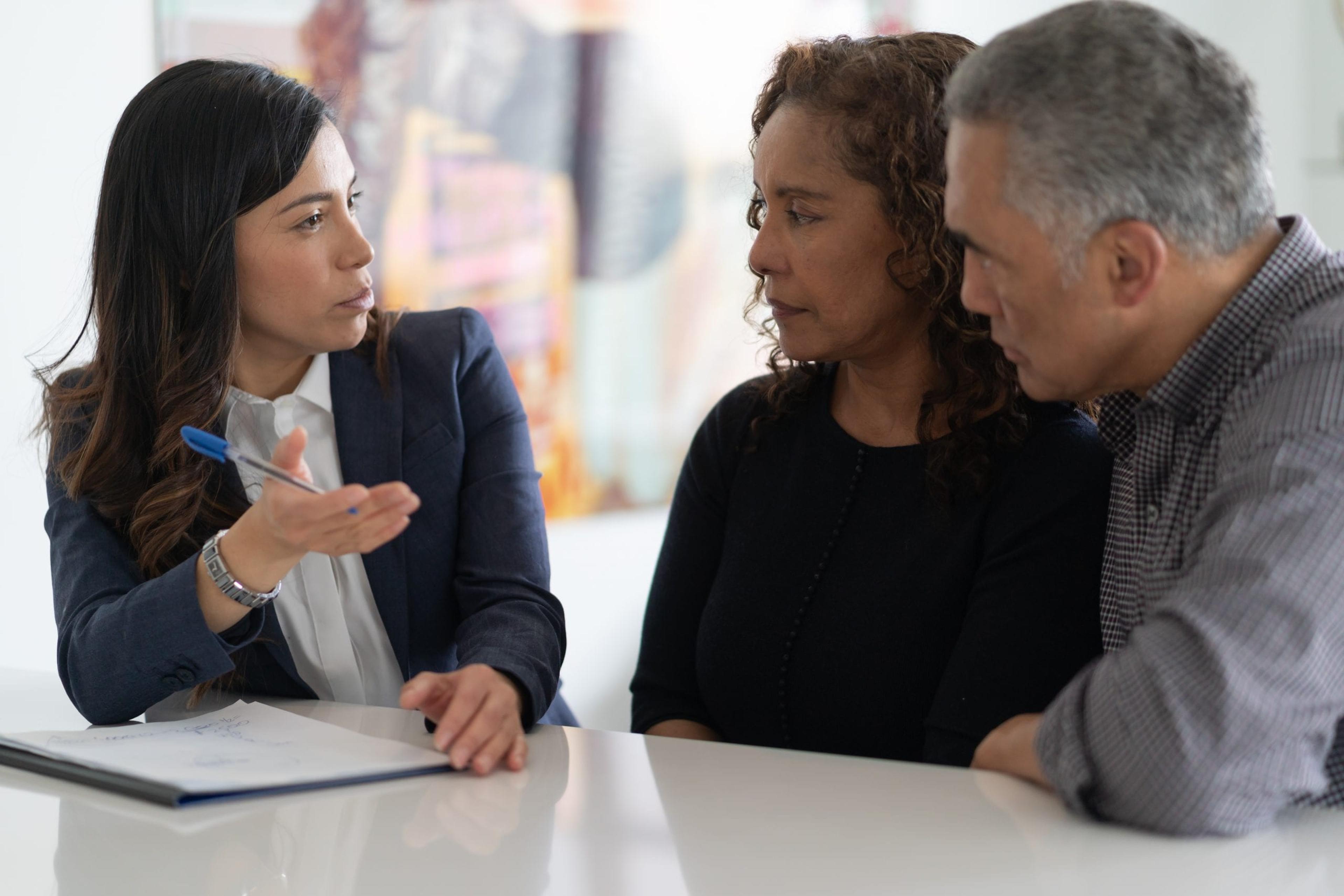 Couple consulting with a financial planner