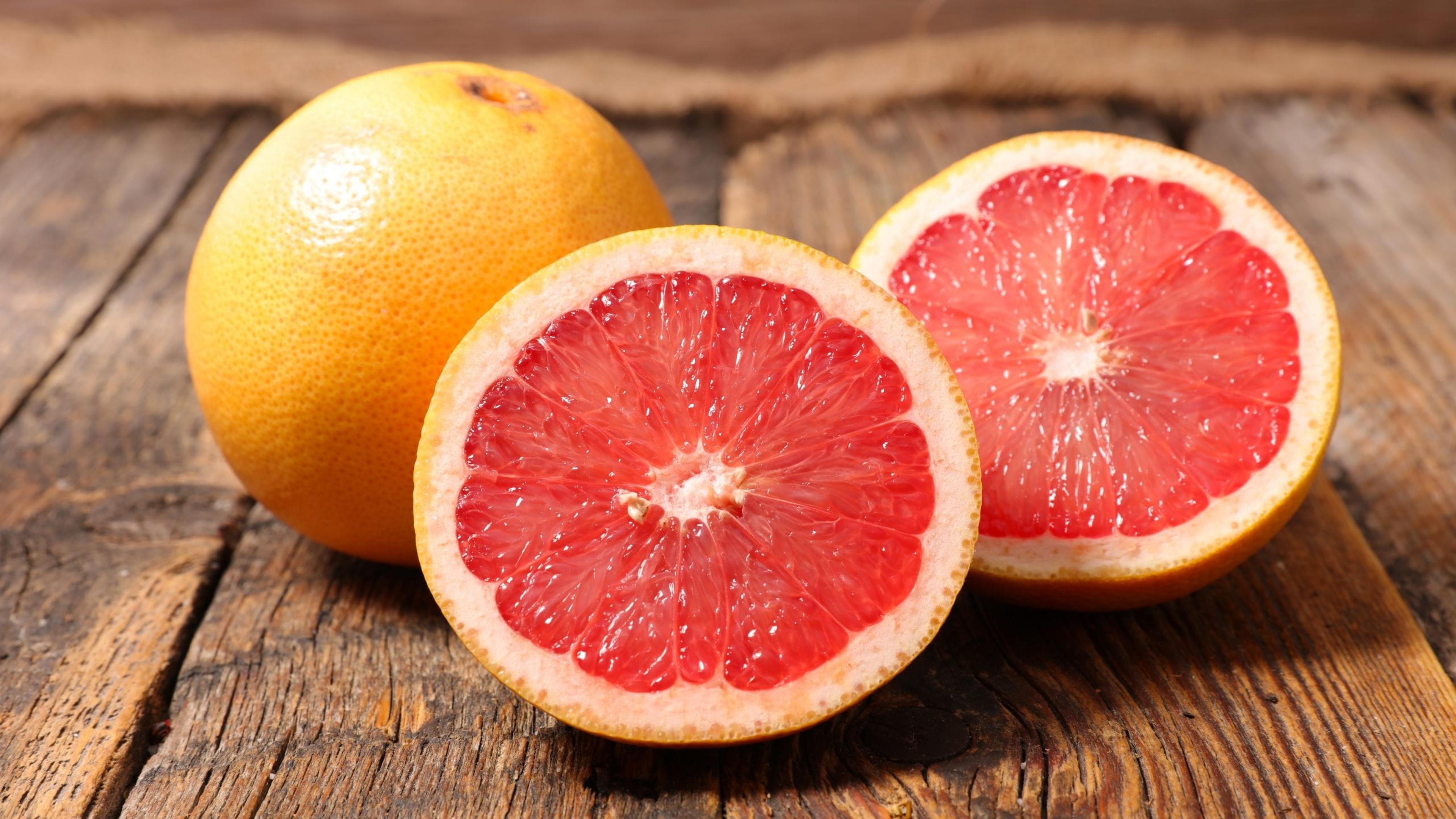 grapefruit on wood background