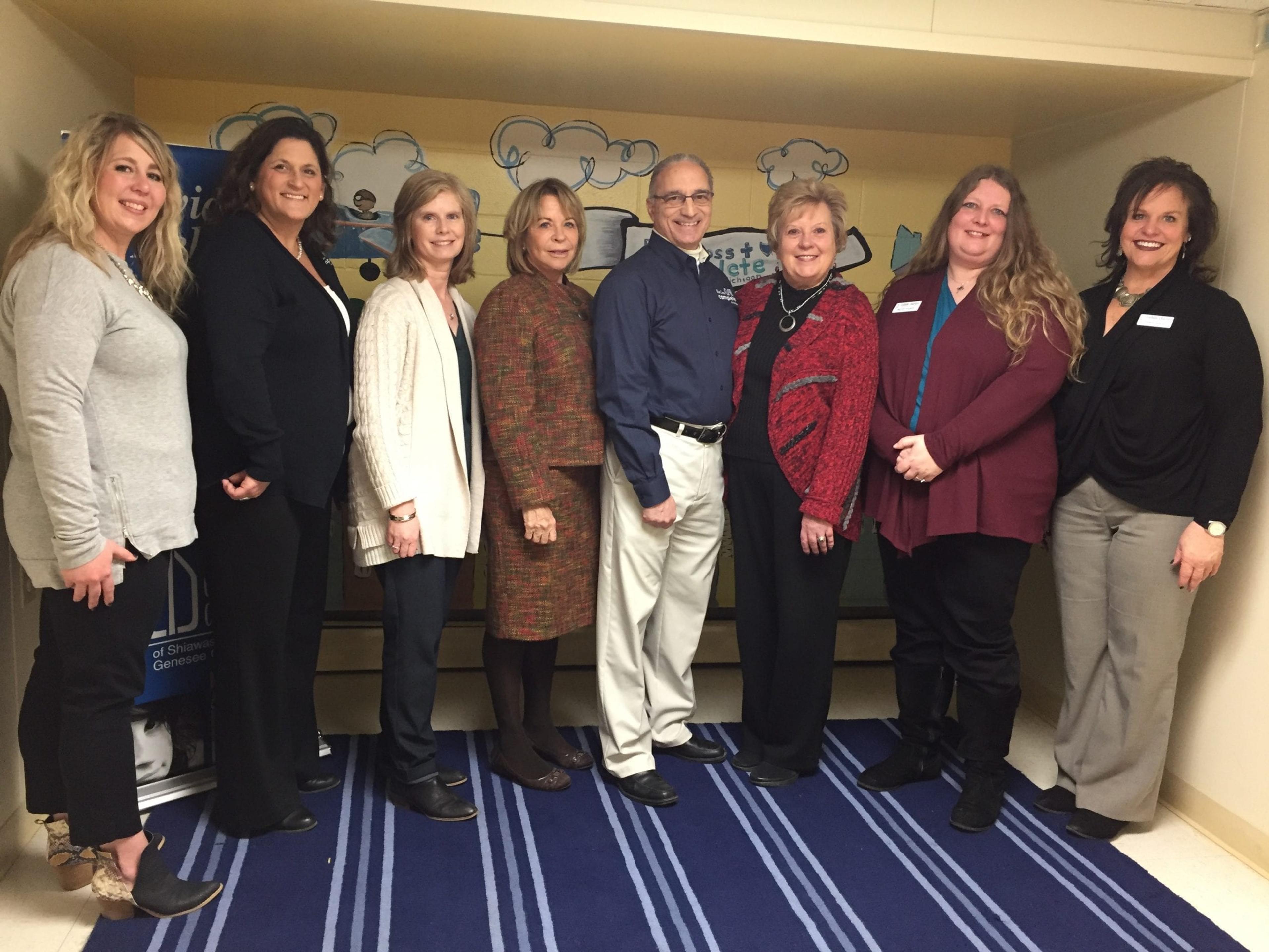 Blue Cross Complete and Catholic Charities employees unveiled the new murals on Friday, March 6 during a special dedication.