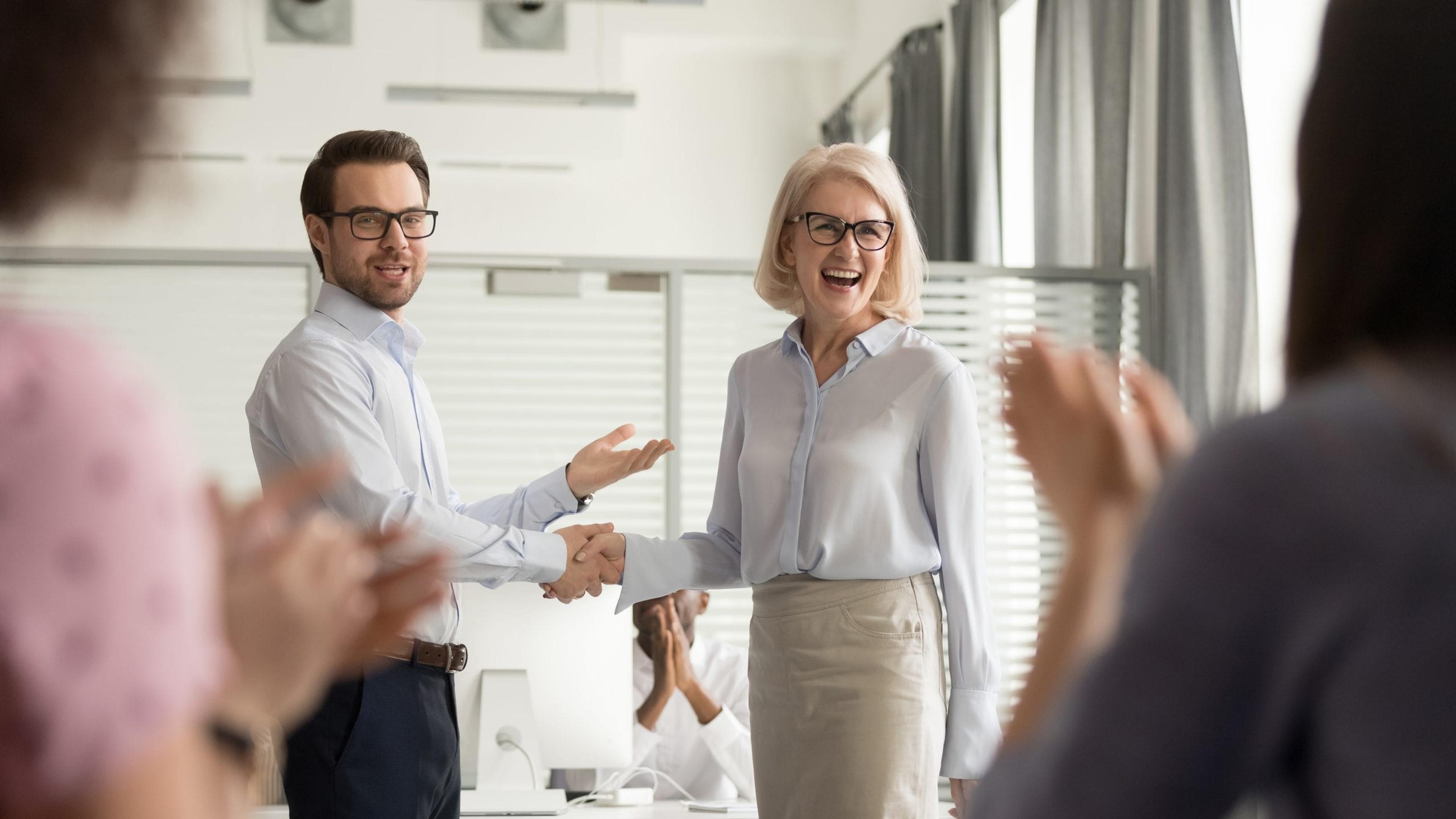 Employee being recognized by her boss.