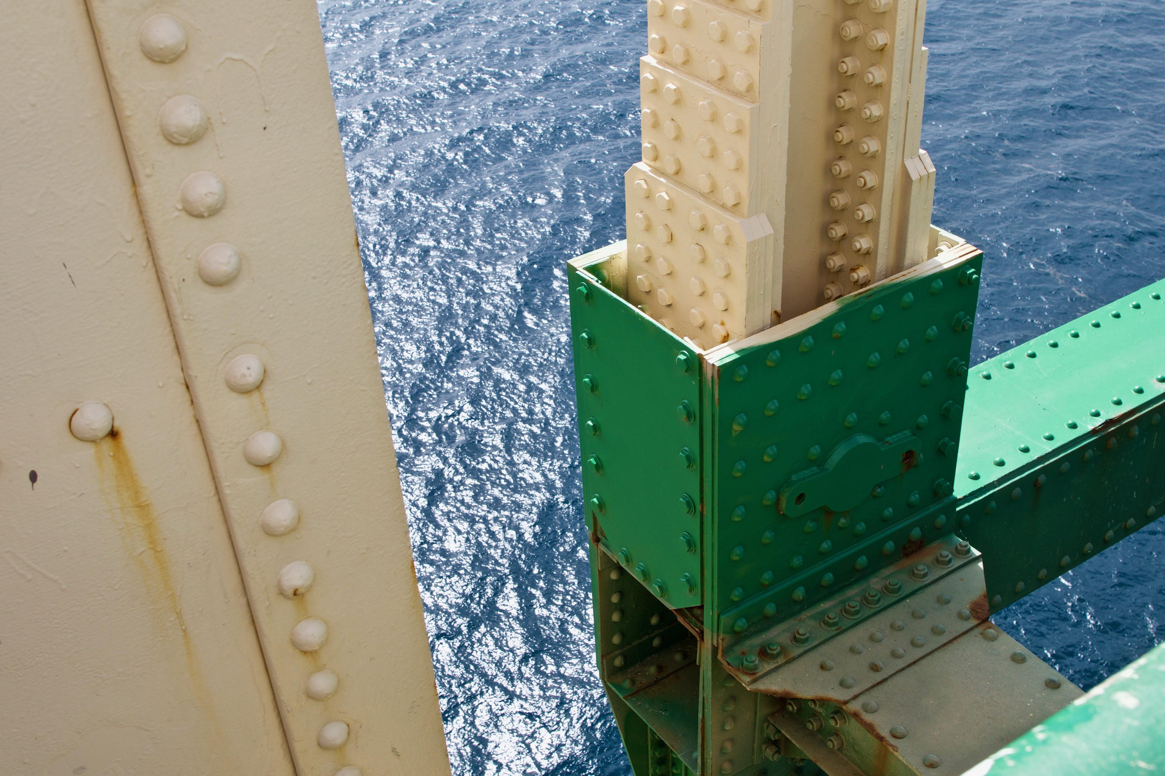 Photo of water below the Mackinac Bridge.