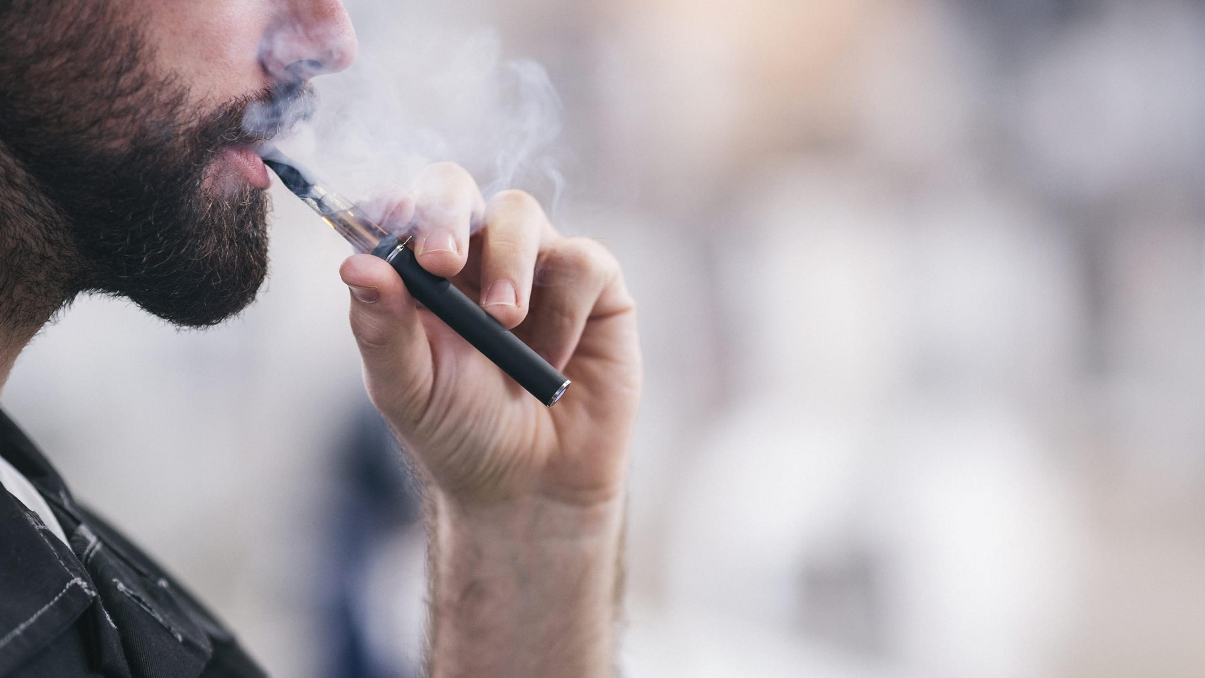 Man using an e-cigarette