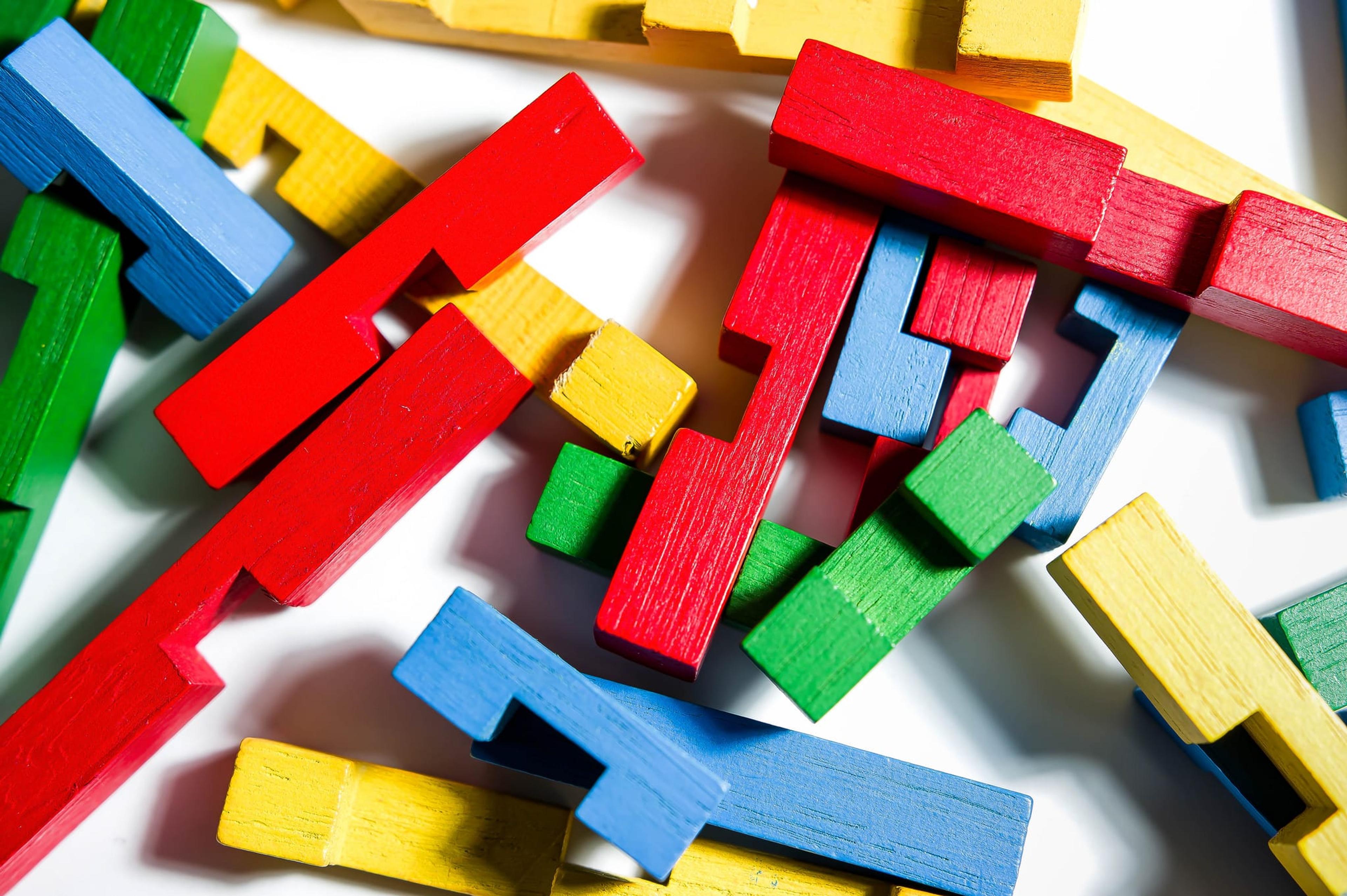 Image of brightly colored blocks against a white background.