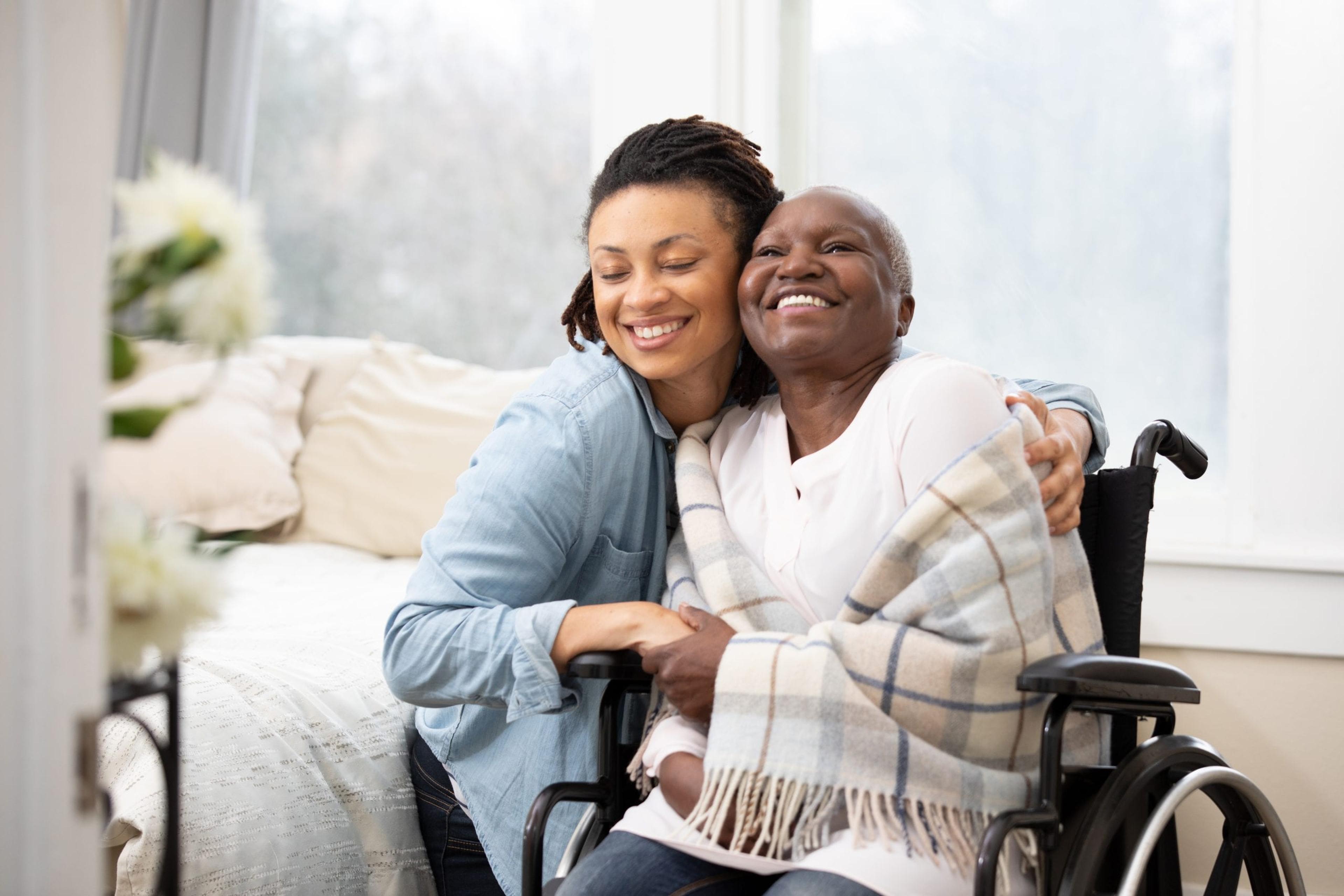 Young woman caring for an elderly relative