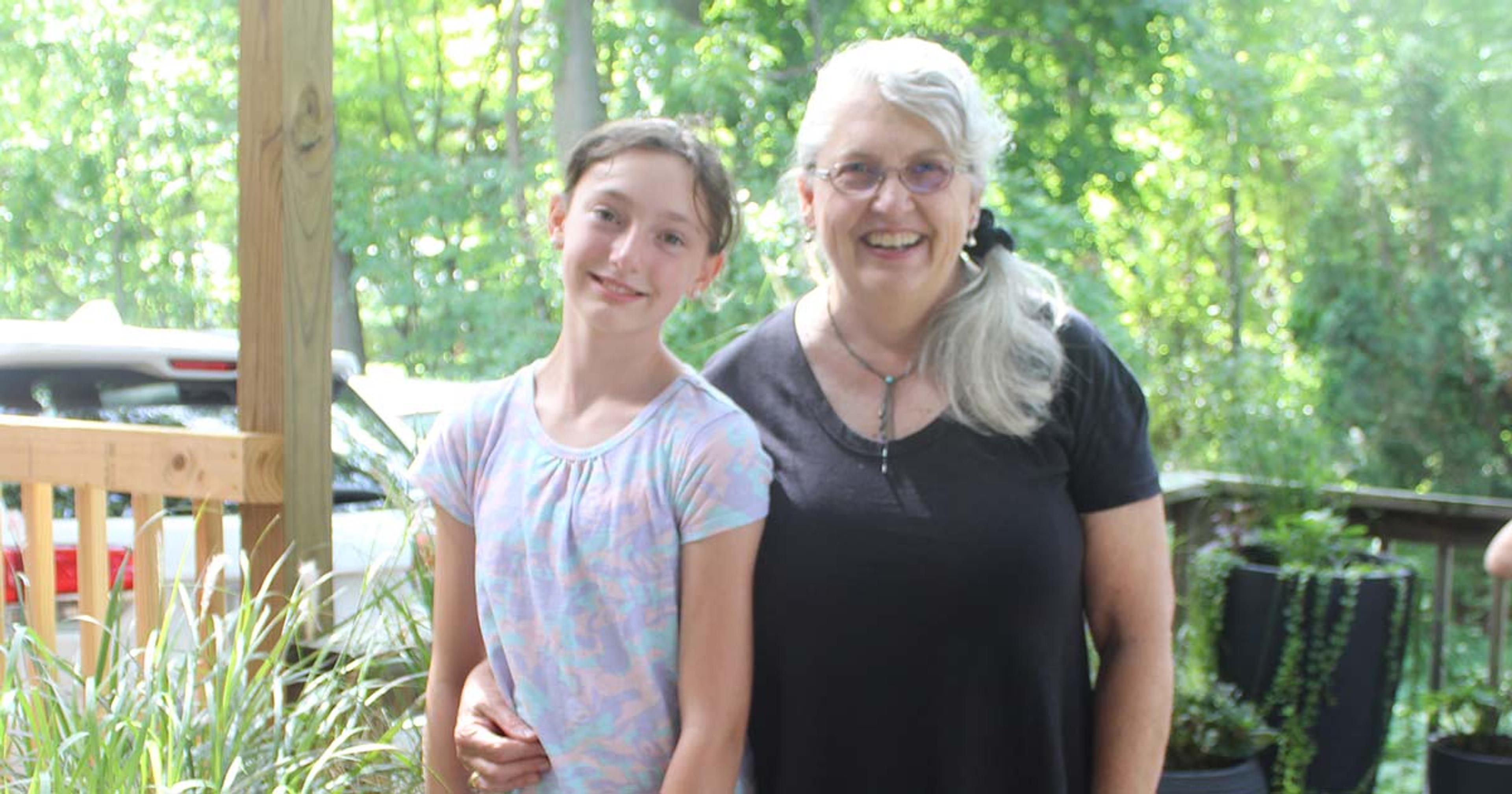 Donna Allgaier-Lamberti of Holland poses for a photograph with her granddaughter.