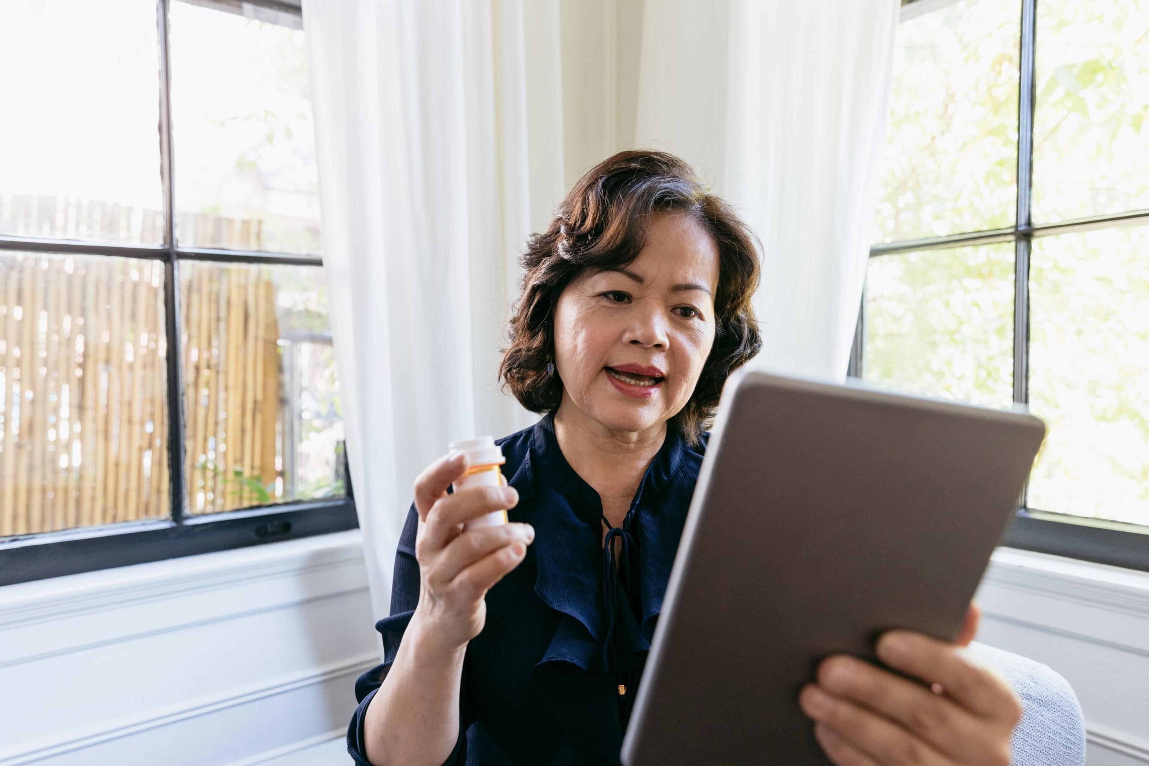 Woman talking to her doctor on a tablet