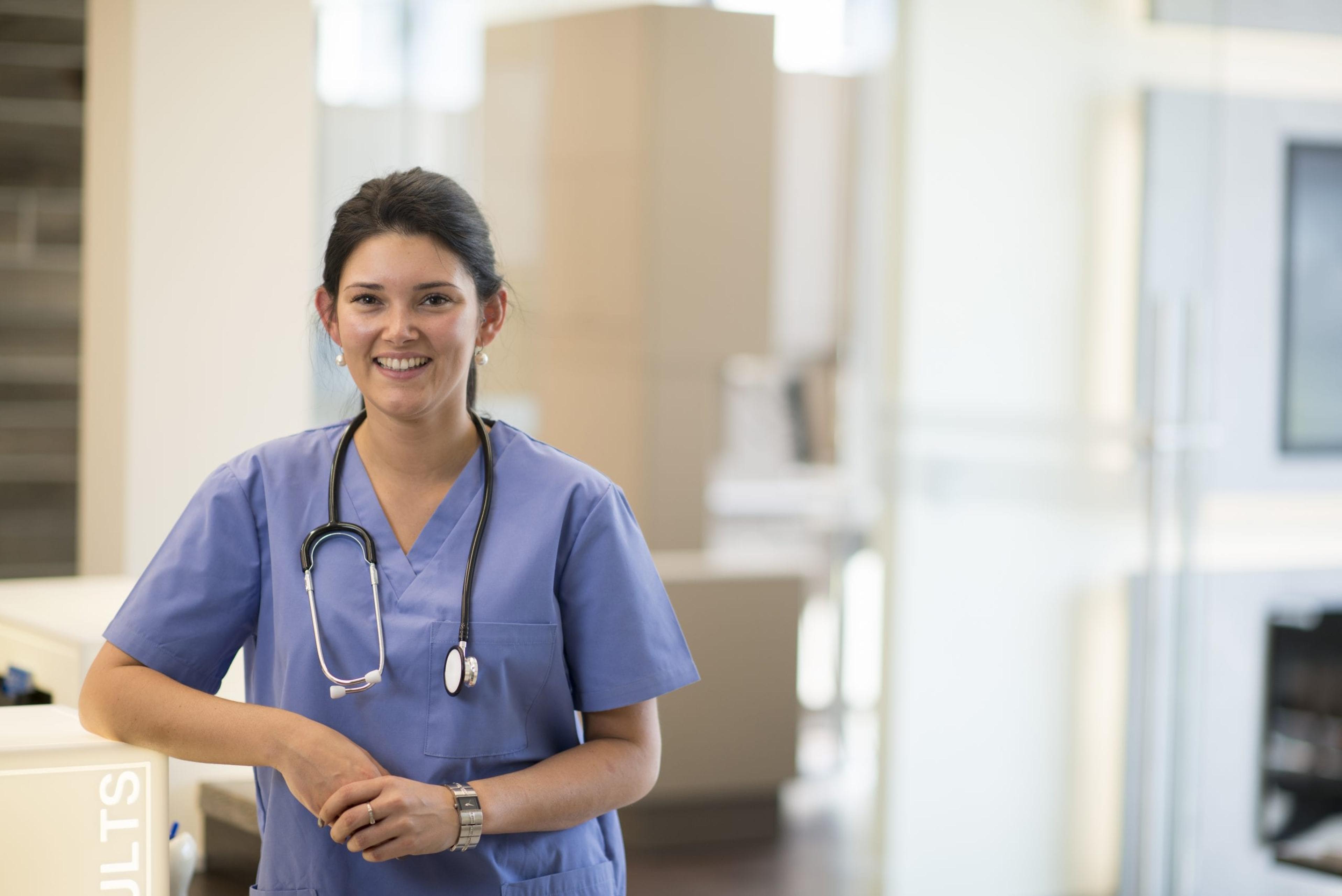 Nurse assistant in a hospital setting.