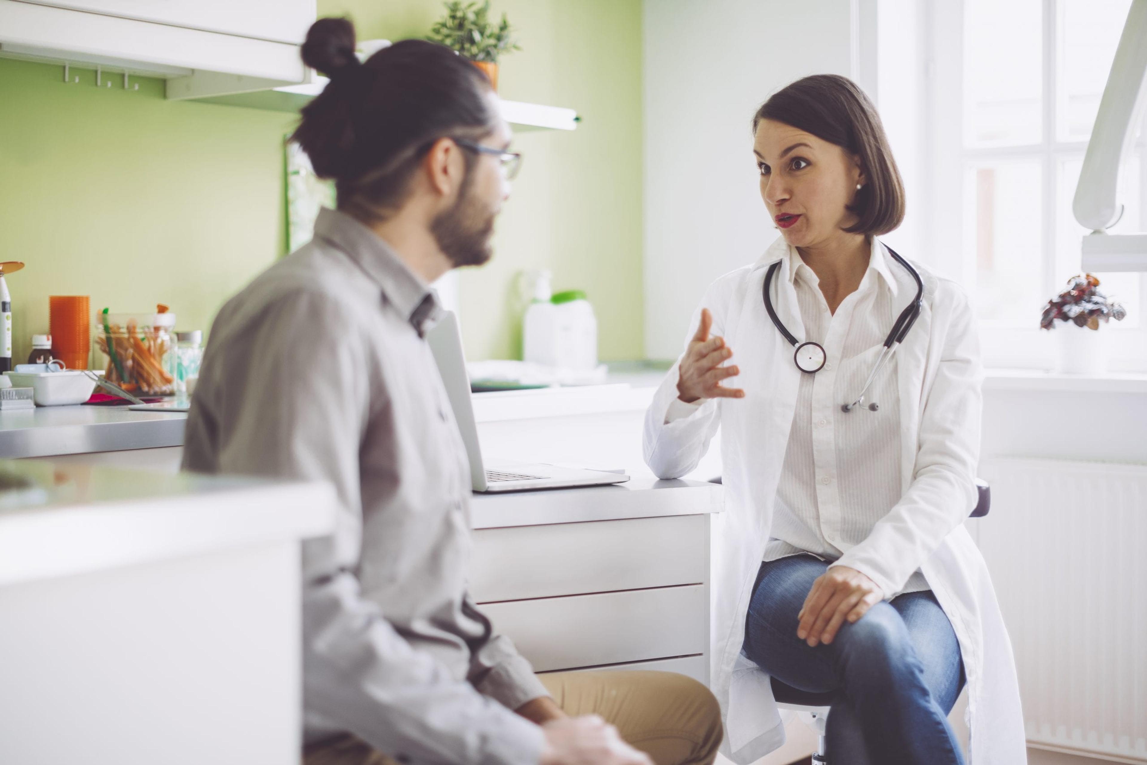 Female doctor consulting her patient