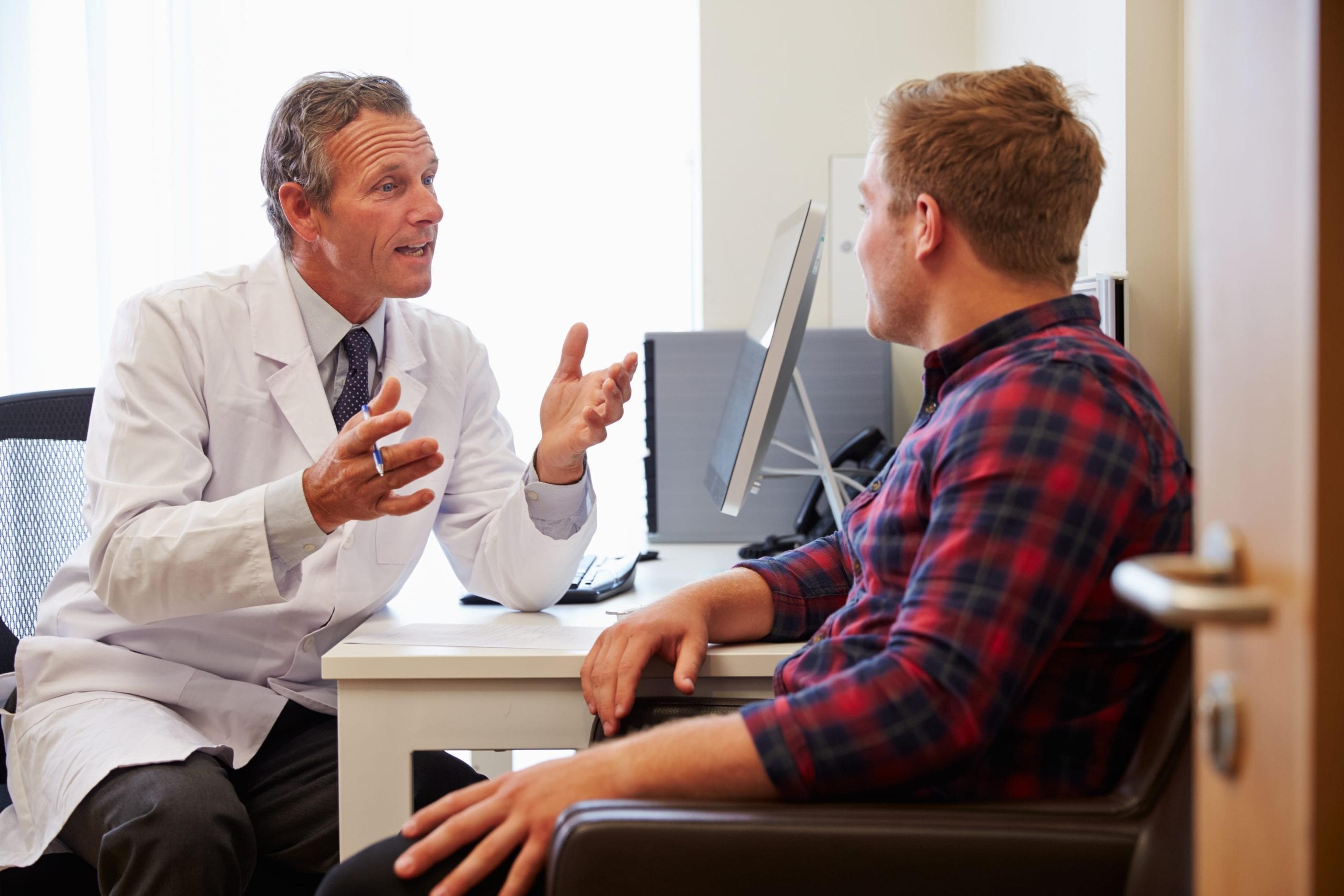 Man talking to his doctor