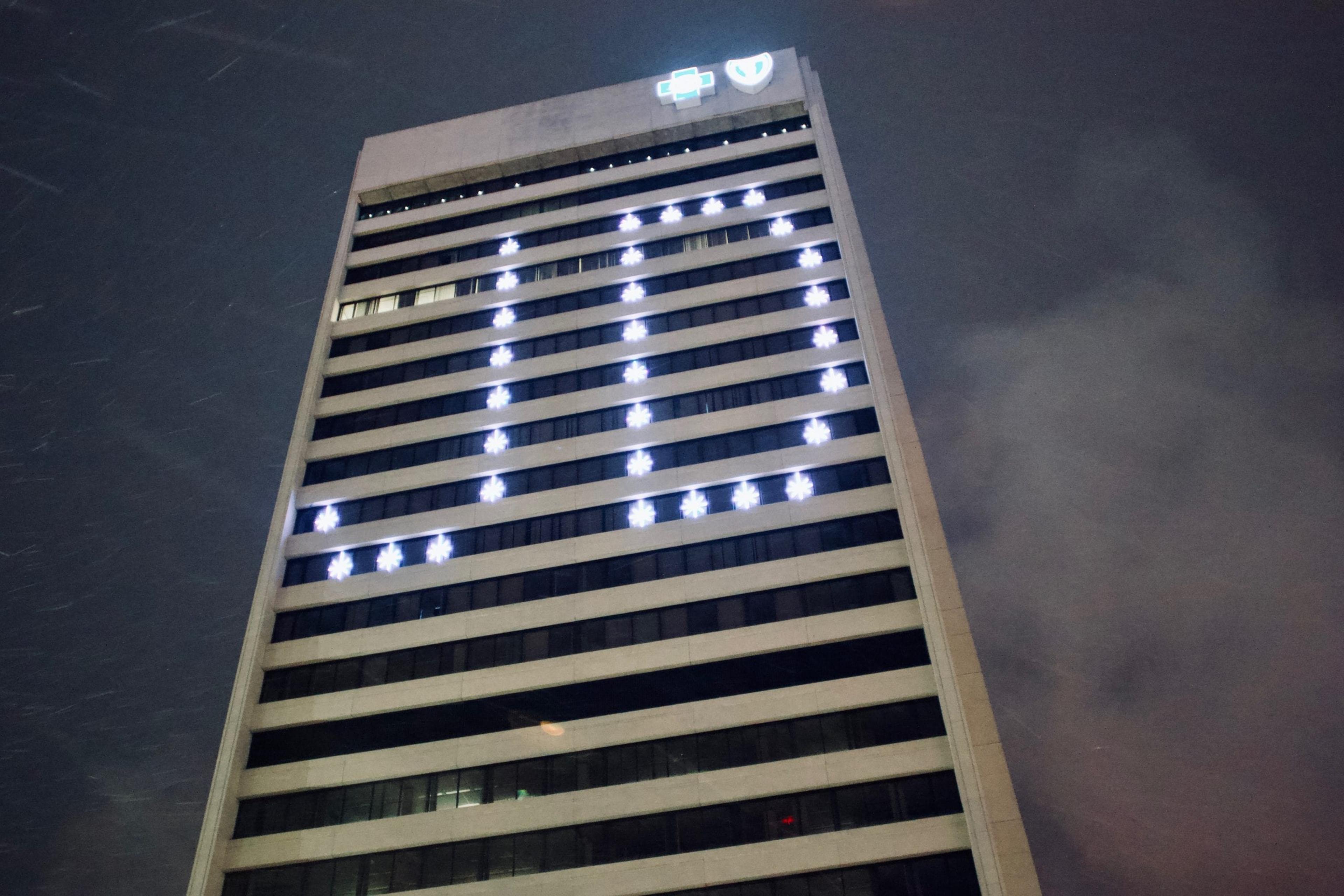 Lights on side of Blue Cross building