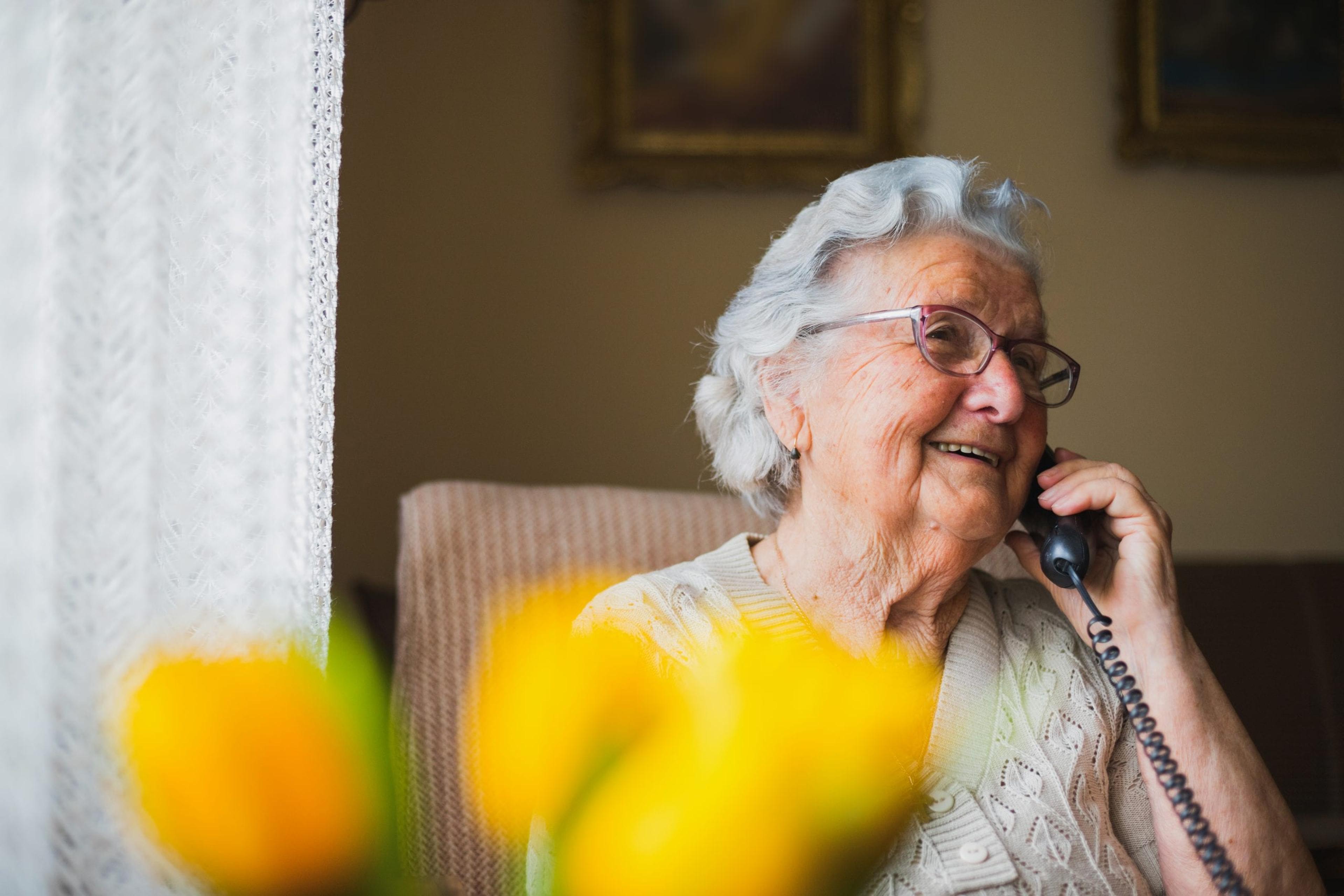 Older woman talking on the phone