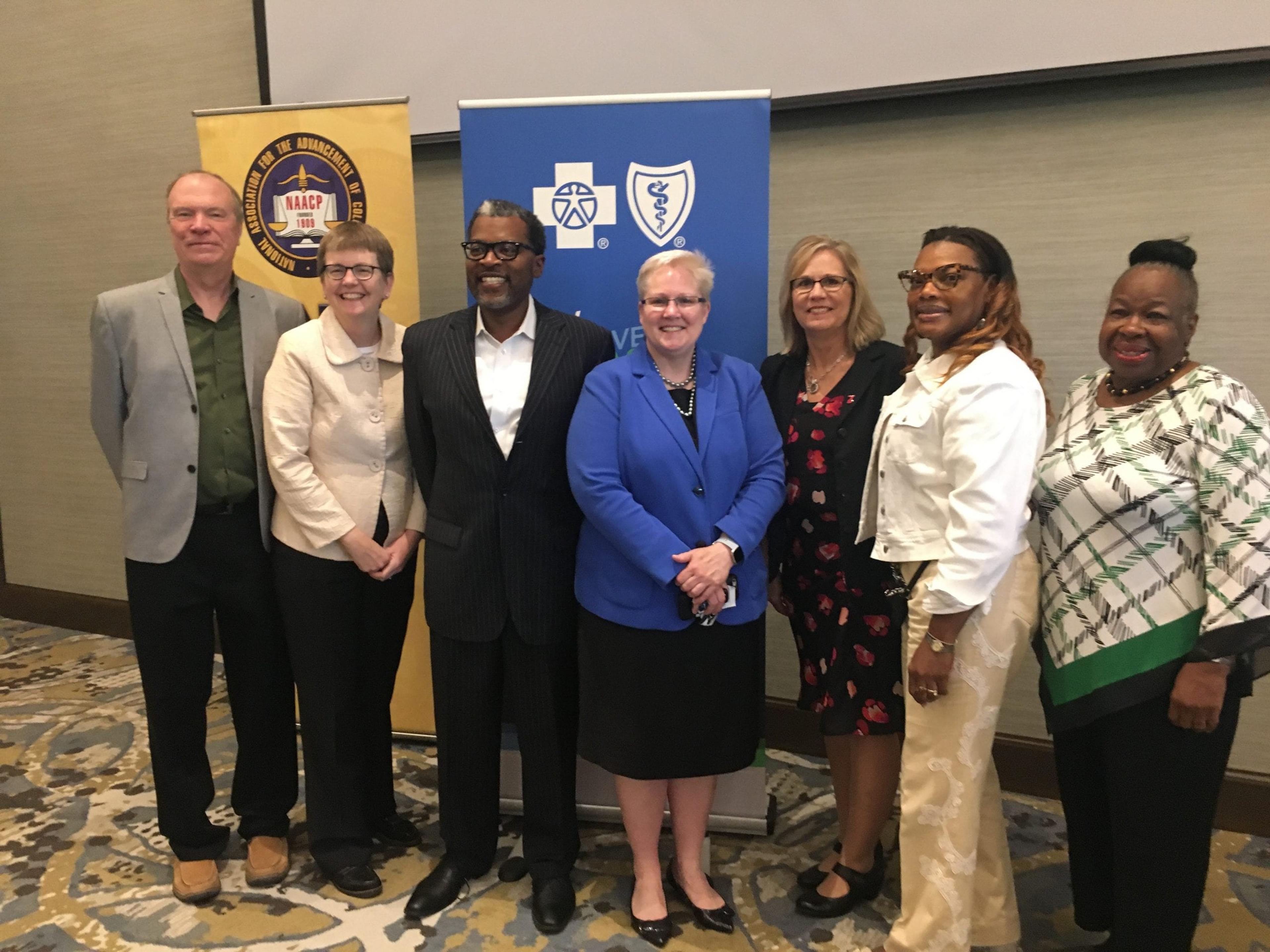 Pictured left to right: Tim Collier, Suzanne Miller Allen, director, Community Responsibility, BCBSM, Cle Jackson, senior liaison, Community Responsibility, BCBSM, Susan Woolner, Kellie Norton, director, West Michigan & Upper Peninsula Administration, Health Plan Business, BCBSM, Dr. Denice Logan, medical director, Blue Care Network and Ellen James, 2nd vice president, Greater Grand Rapids NAACP.