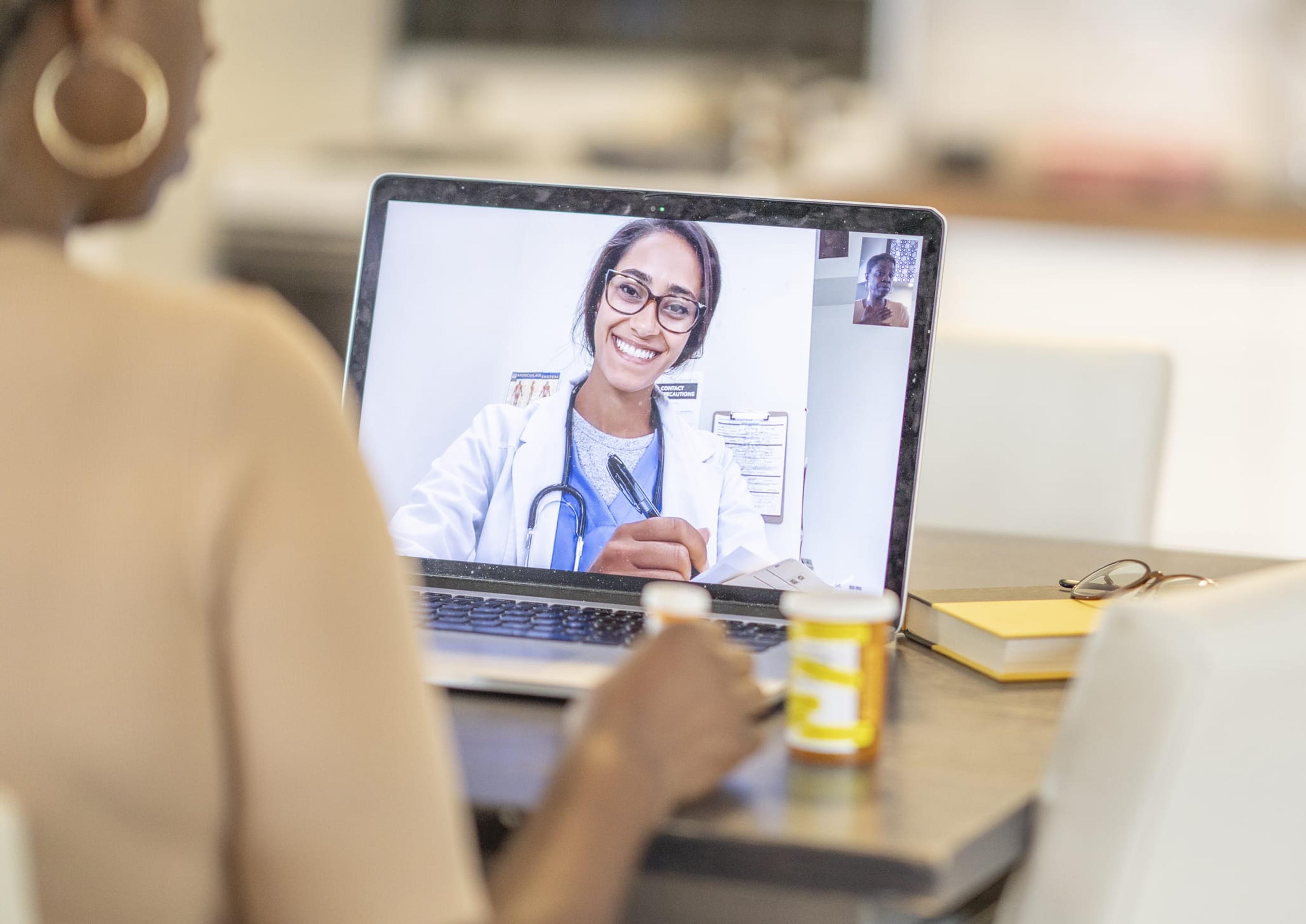 Woman using telehealth