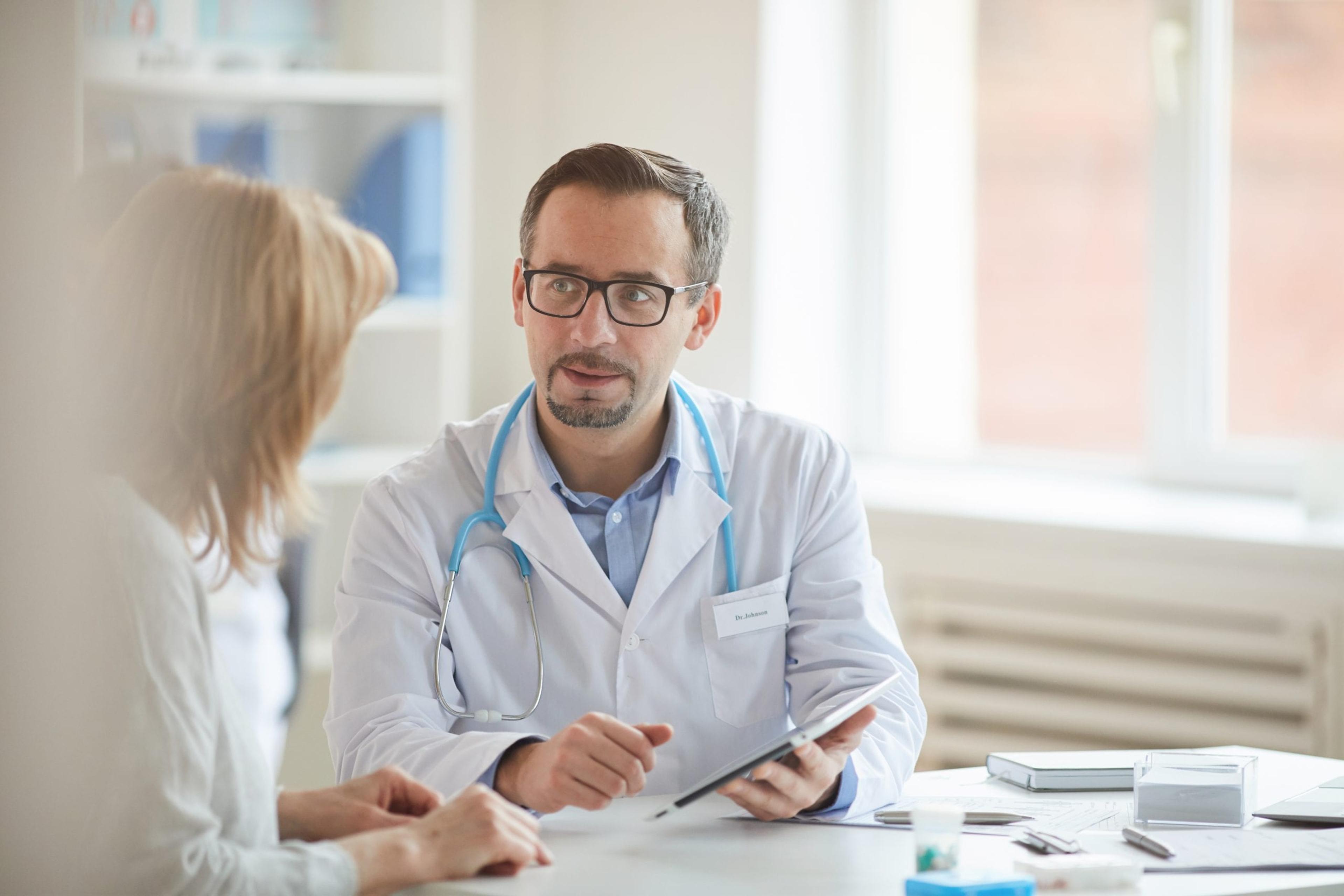 Doctor talking to a patient