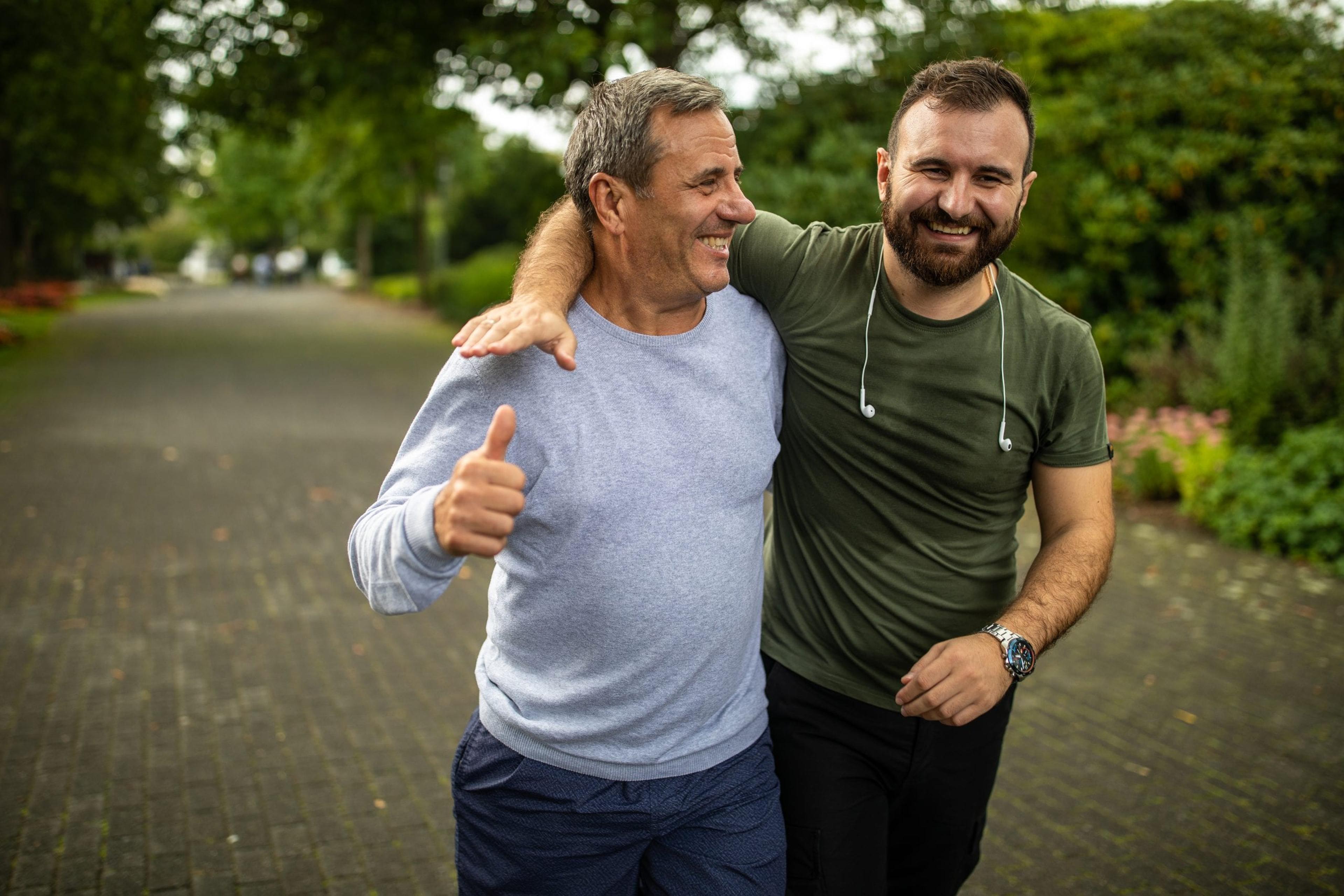 Men jog together