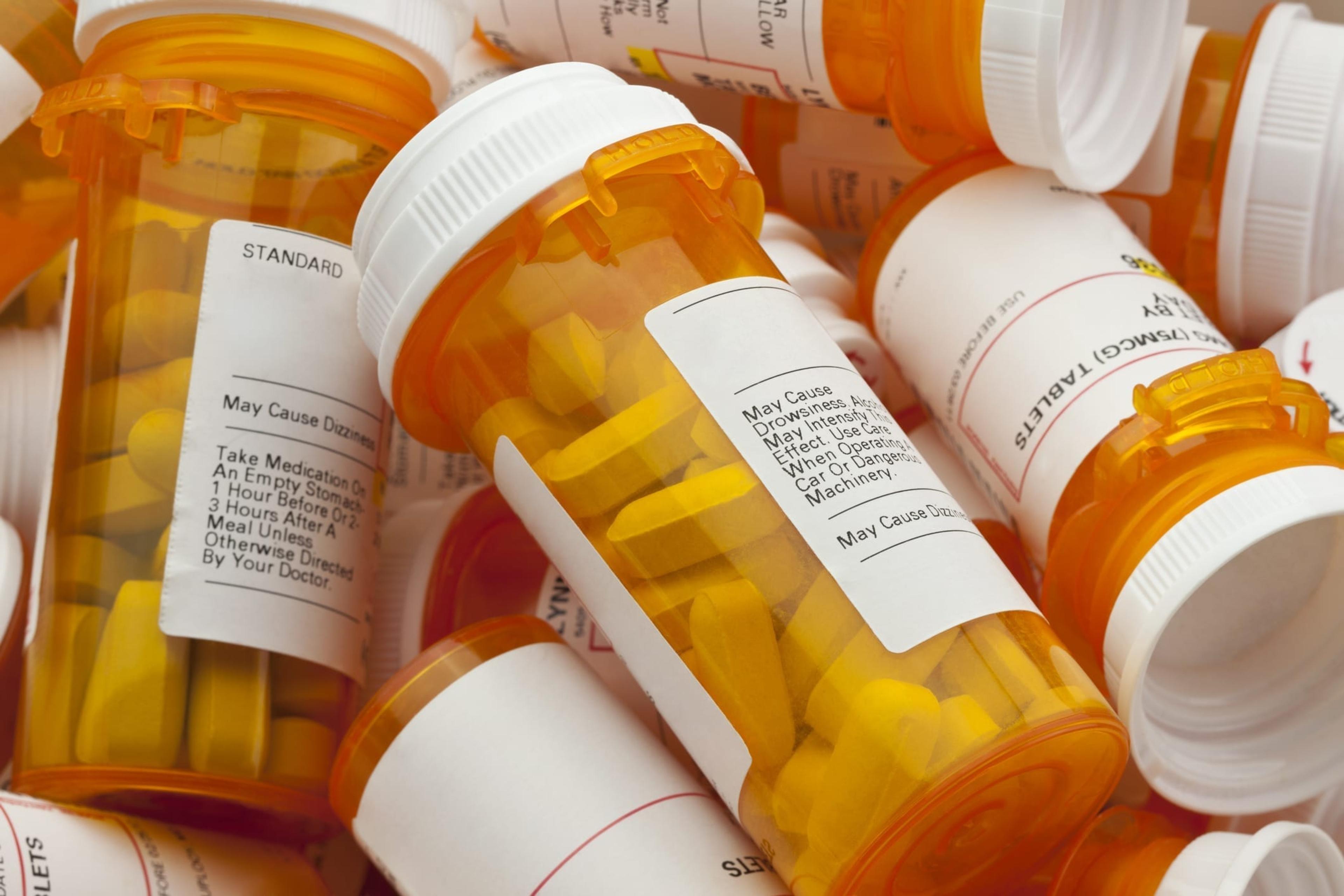 A pile of prescription pill bottles