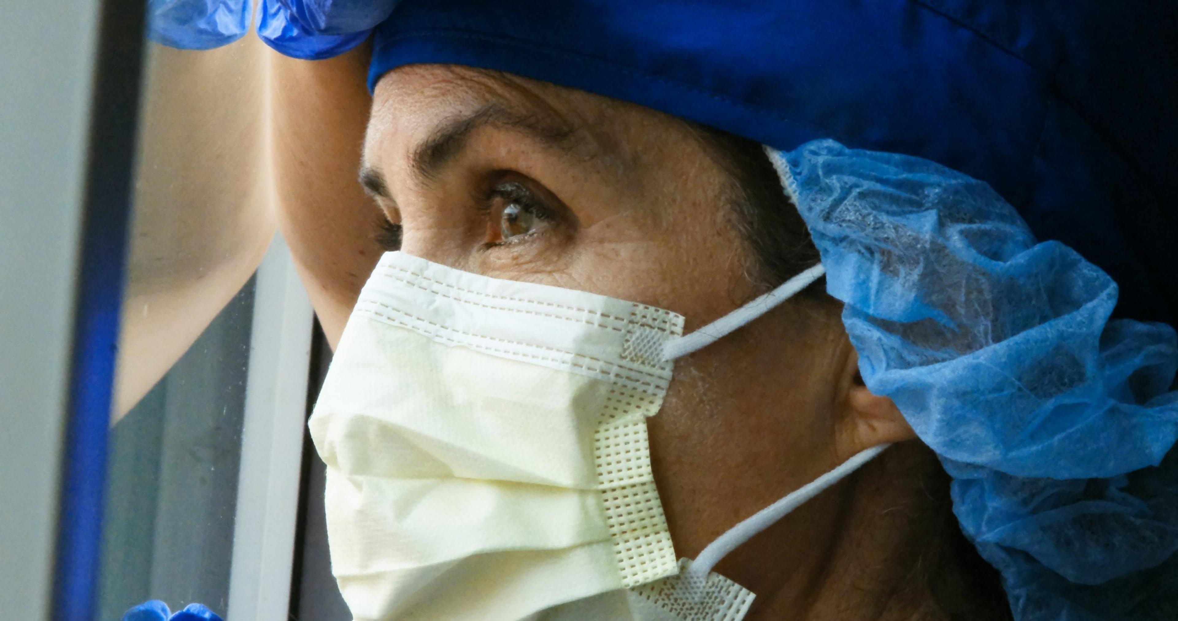 Female health care worker wearing a mask