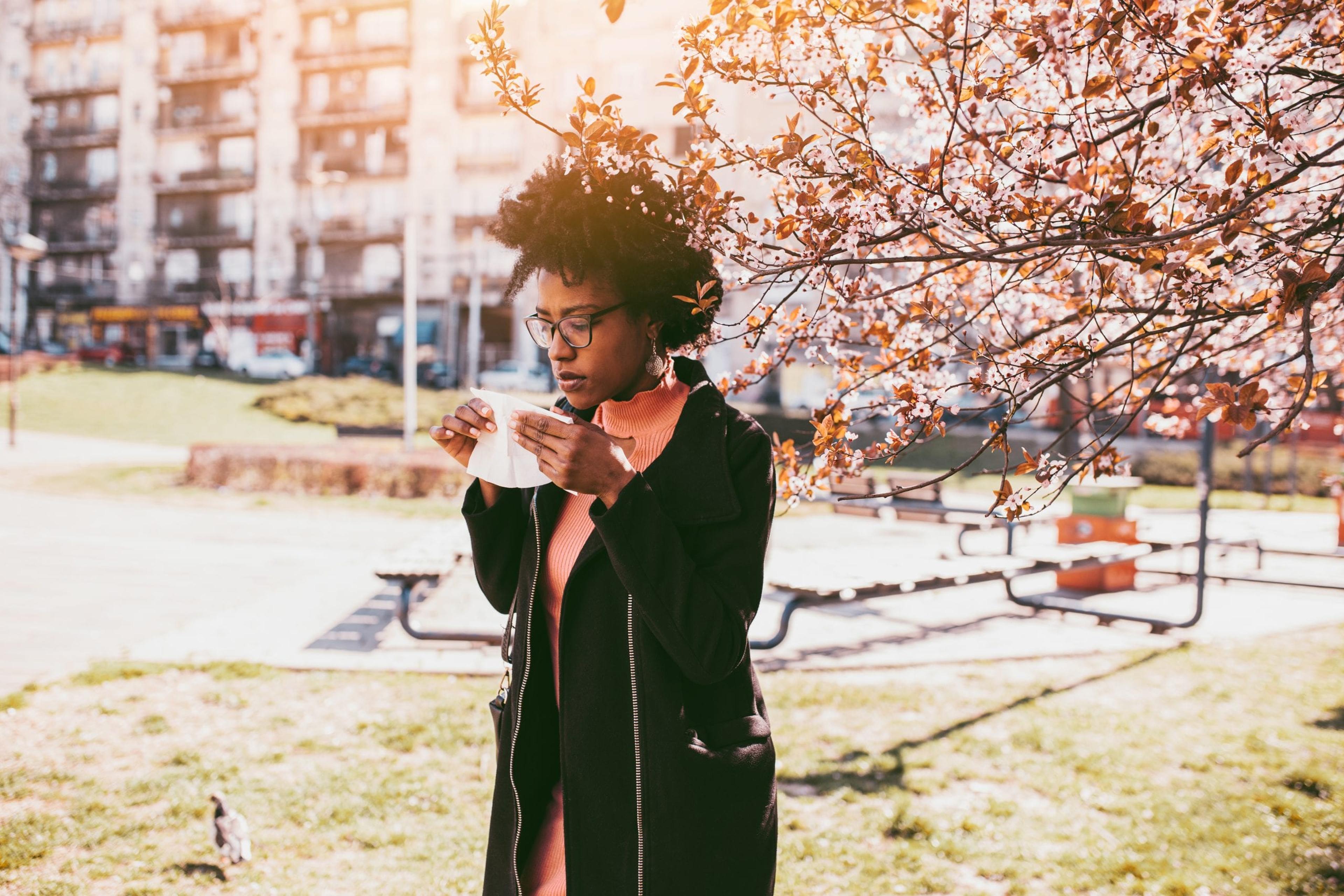 Woman sneezing