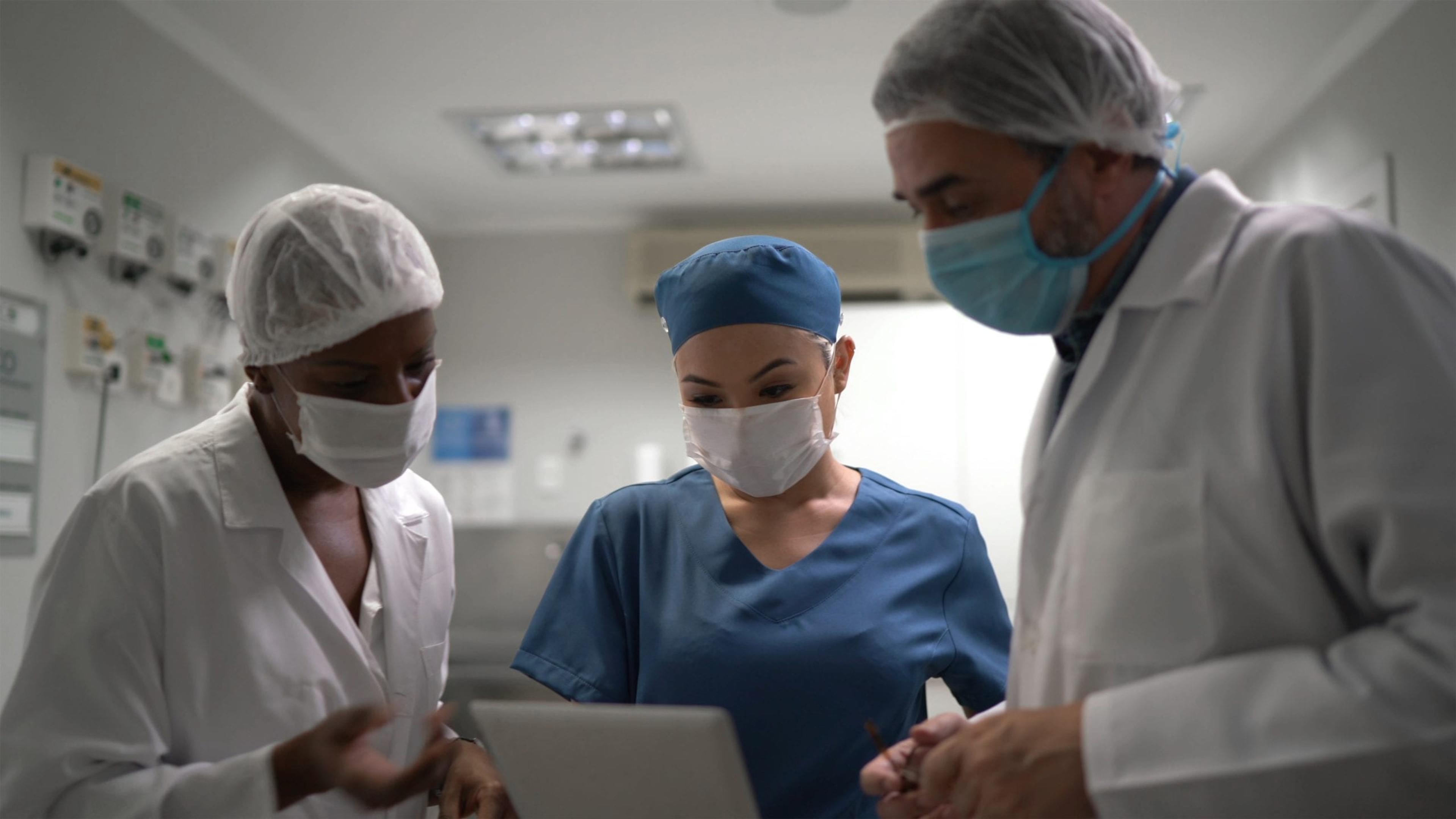 Doctors discussing a patient's care