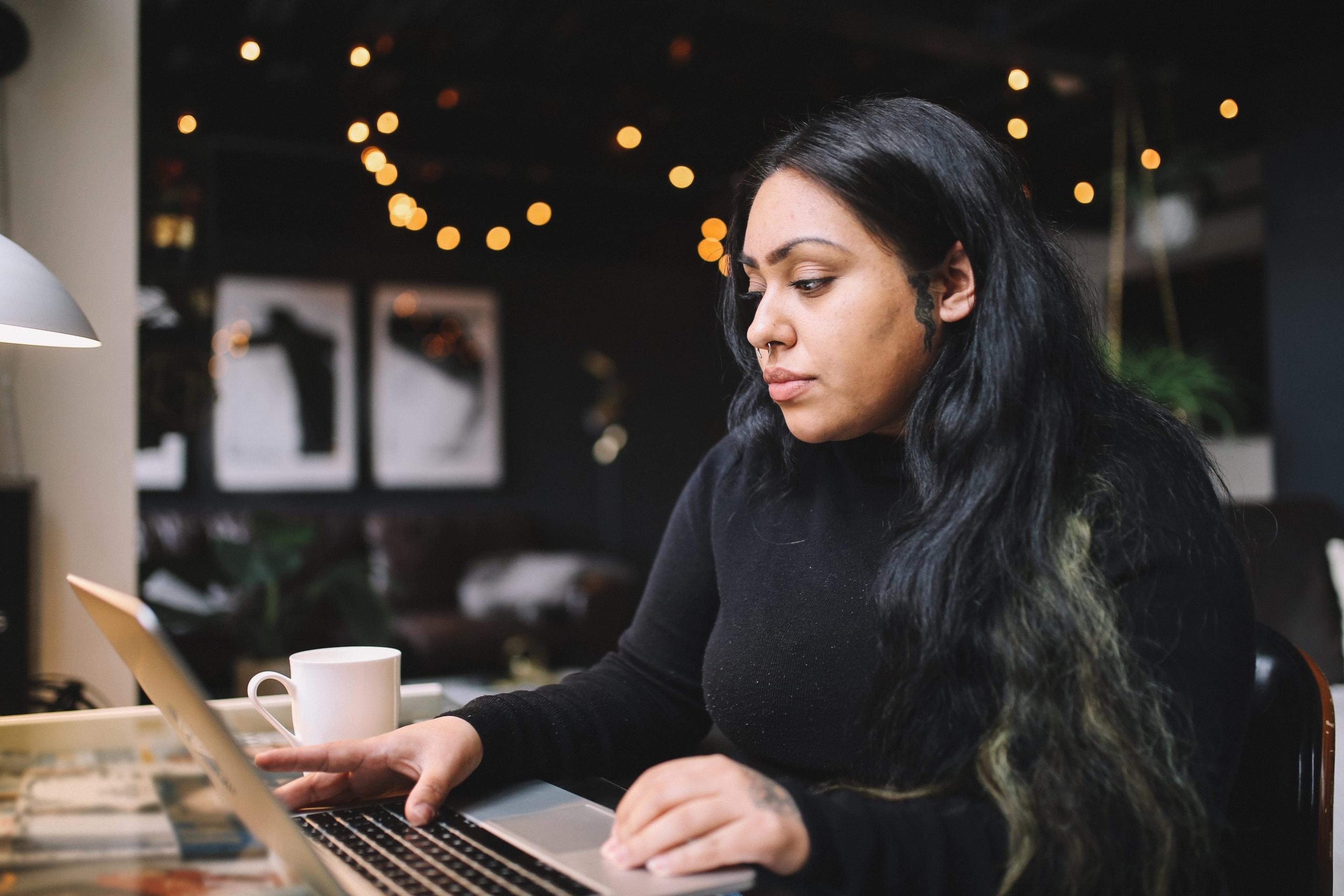 Woman working on her lap