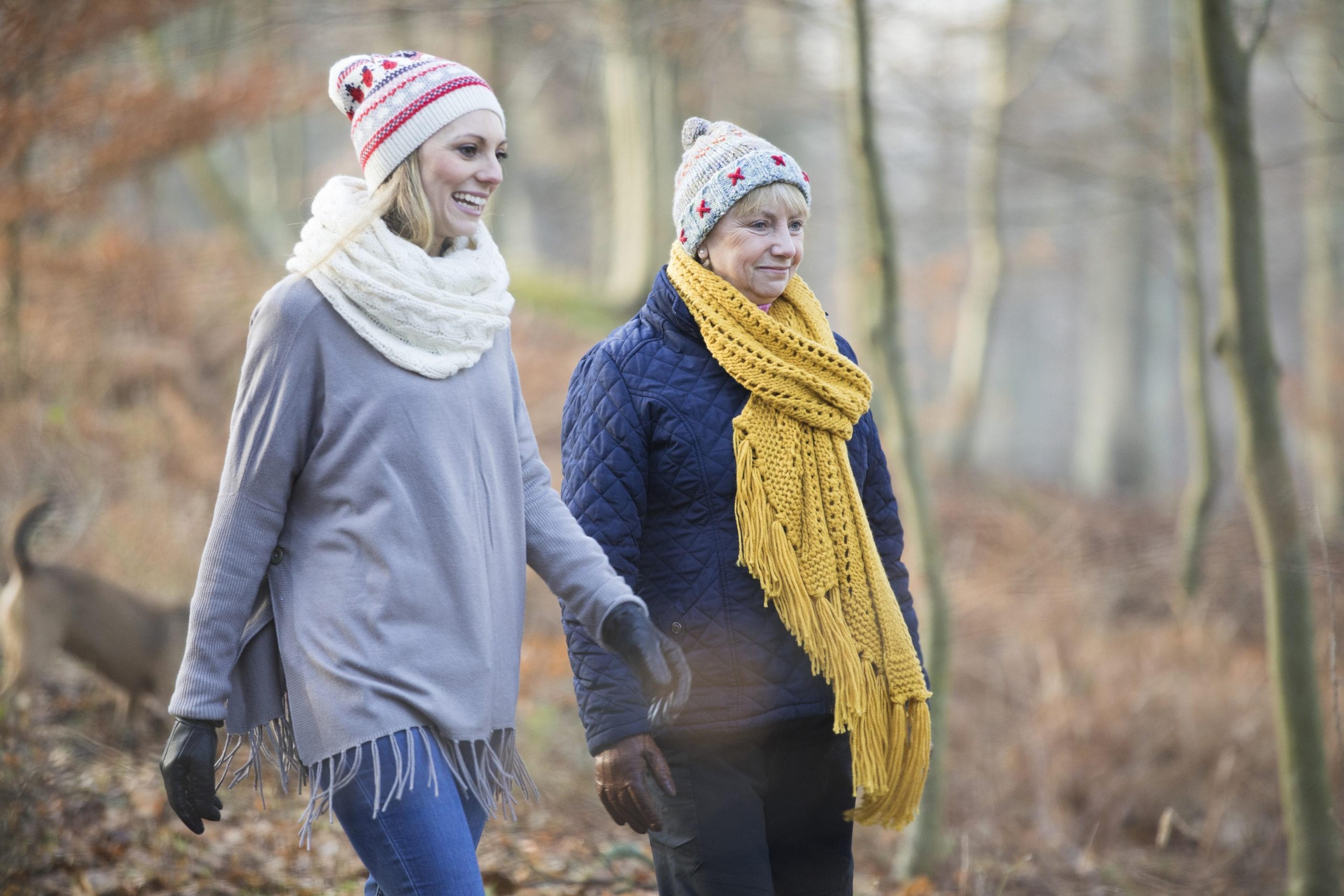 Mom and daughter taking a winter walk together.