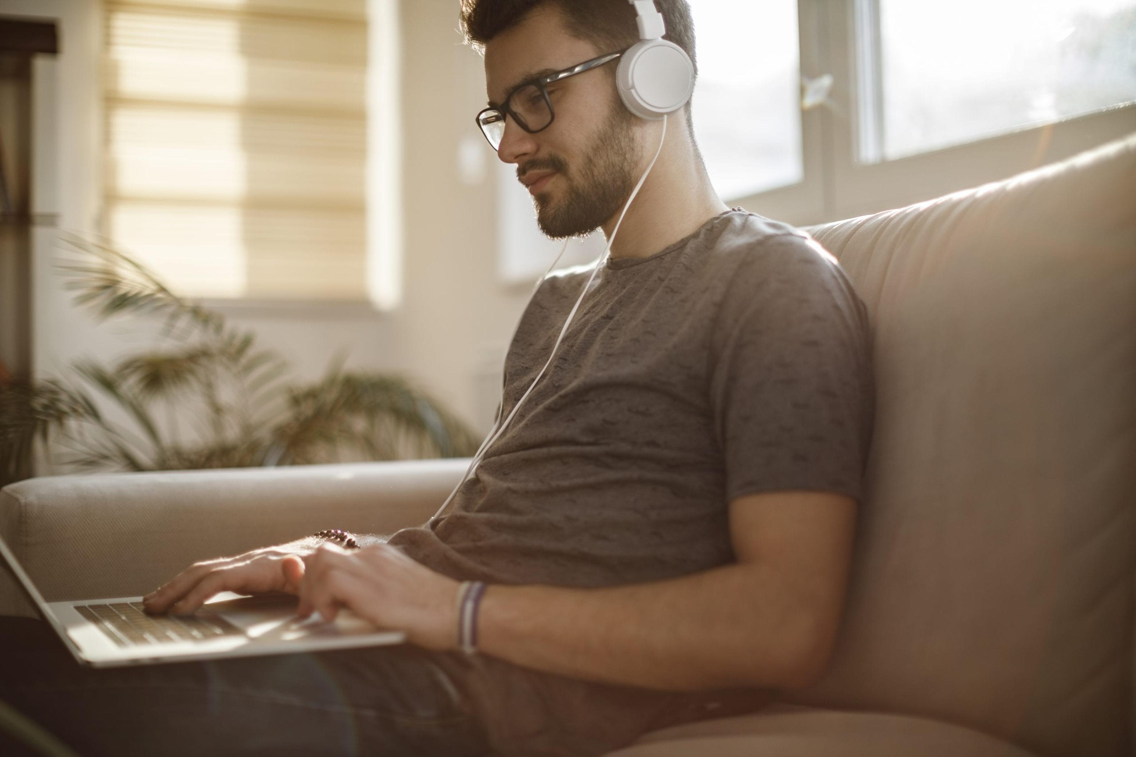 Man looking at his laptop