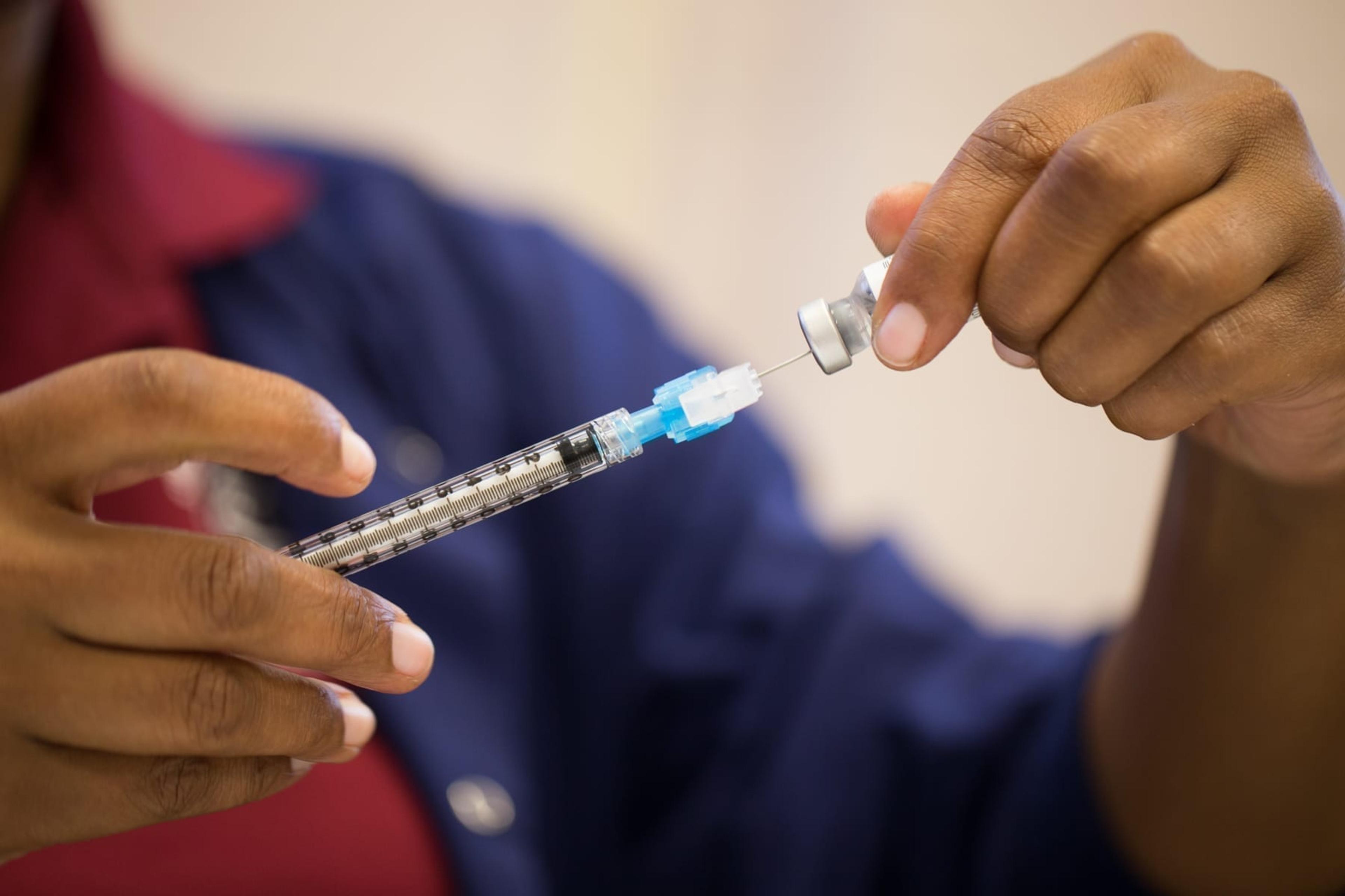 Nurse preparing a flu shot