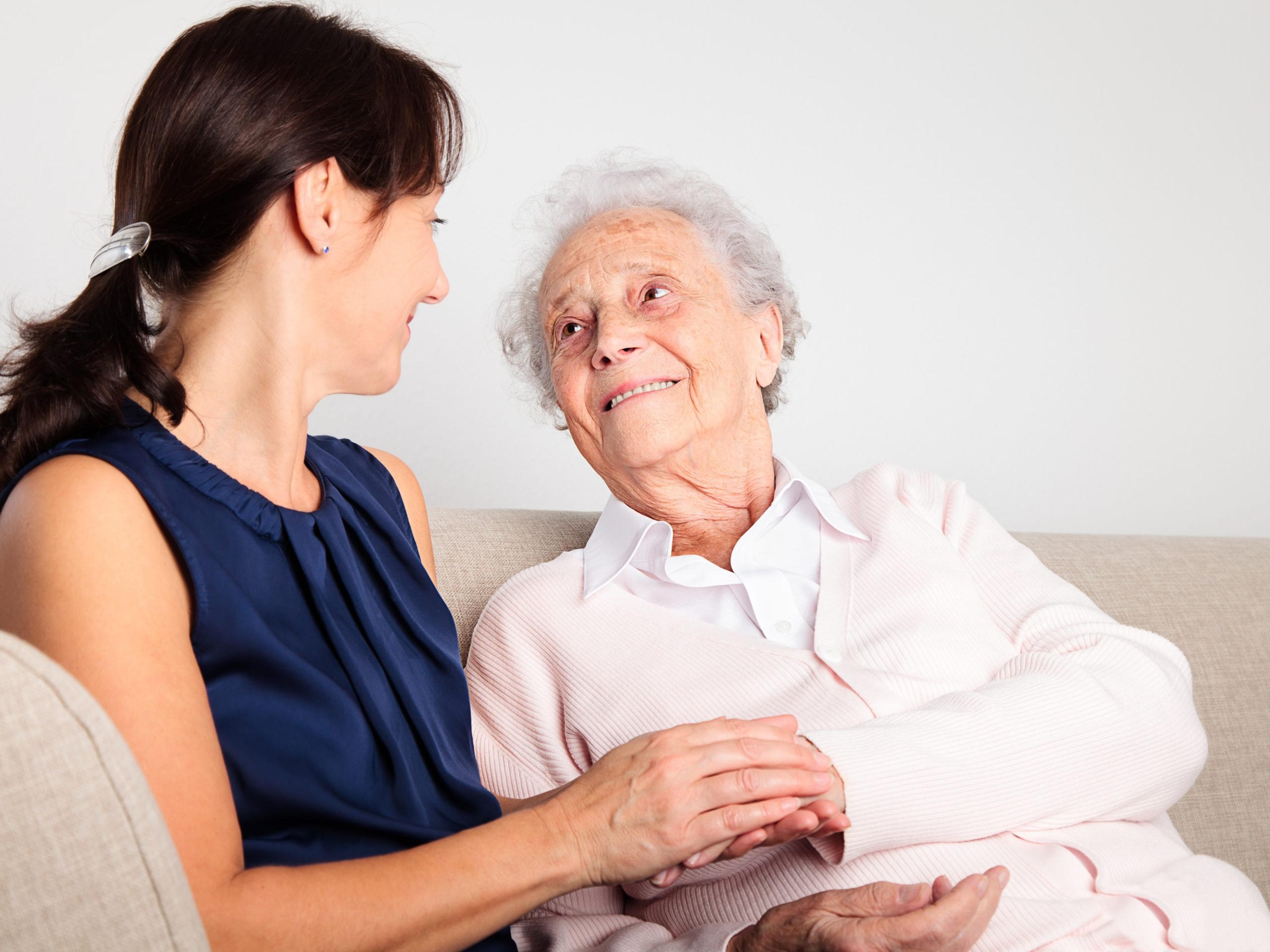 Older woman with her caregiver.