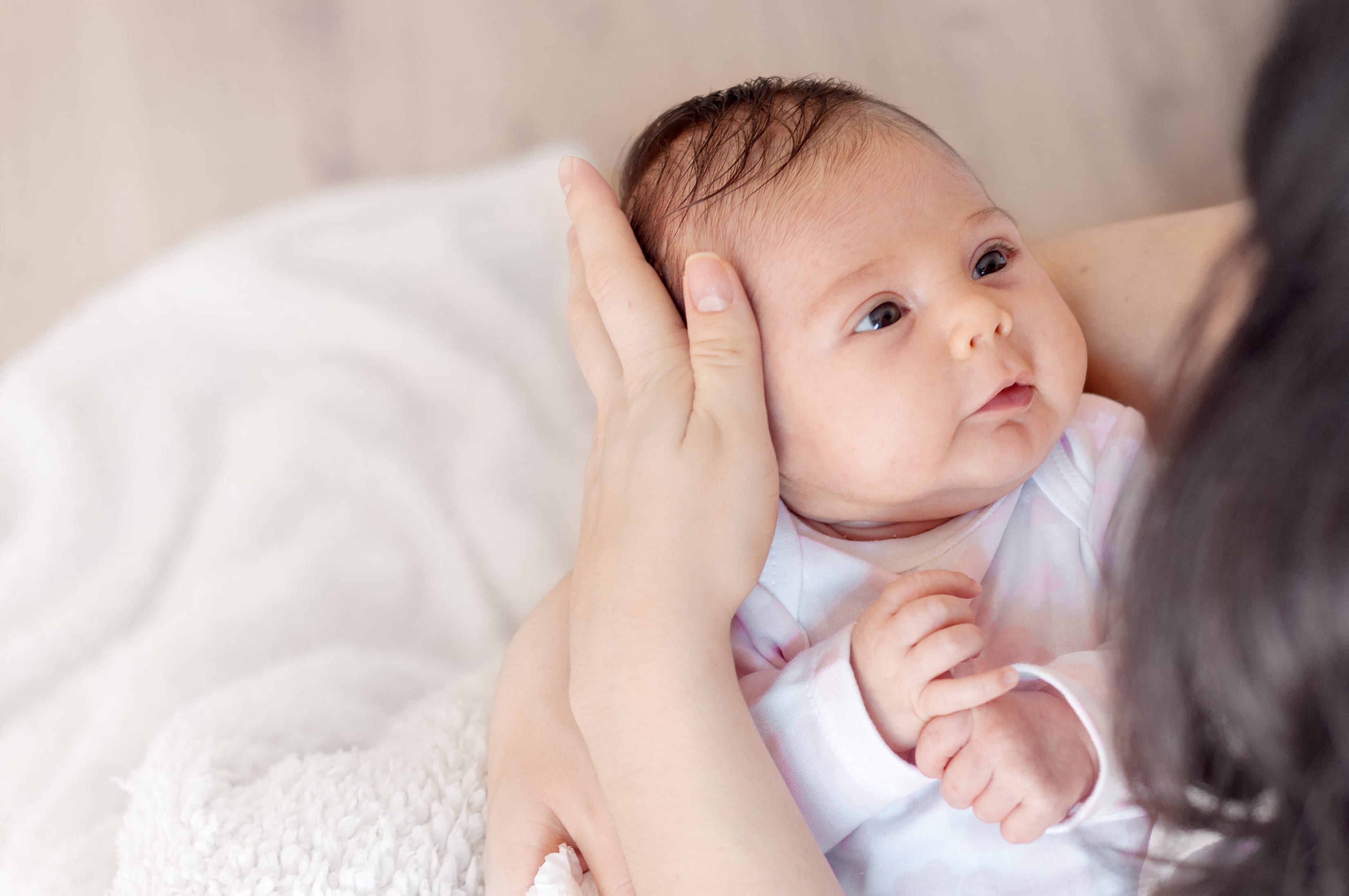 Breastfeeding 101: How long should a newborn feed for?