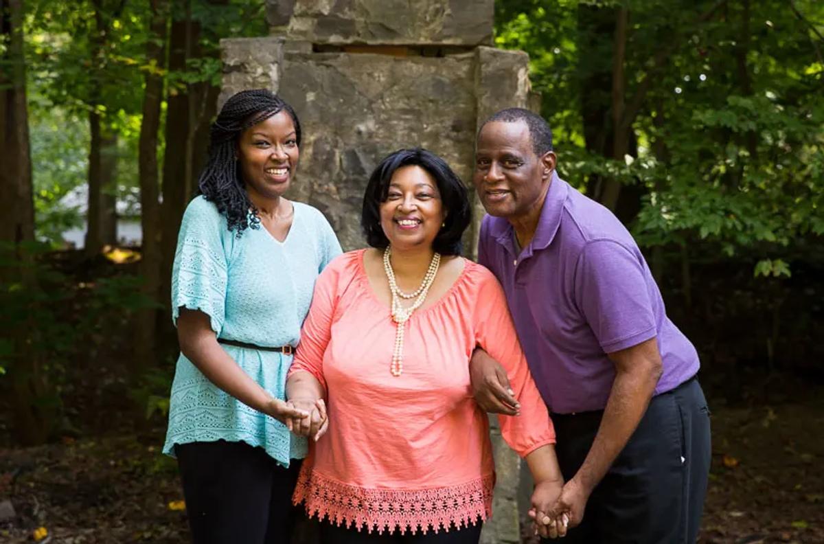 eCaregiver Aisha Adkins with her mother and father. Aisha is a full-time caregiver for her mother who has dementia. (Photo courtesy of Love Not Lost.)
