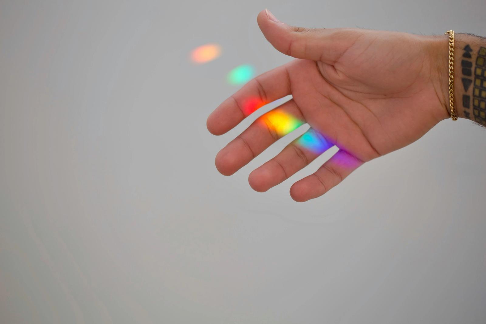 hand with rainbow