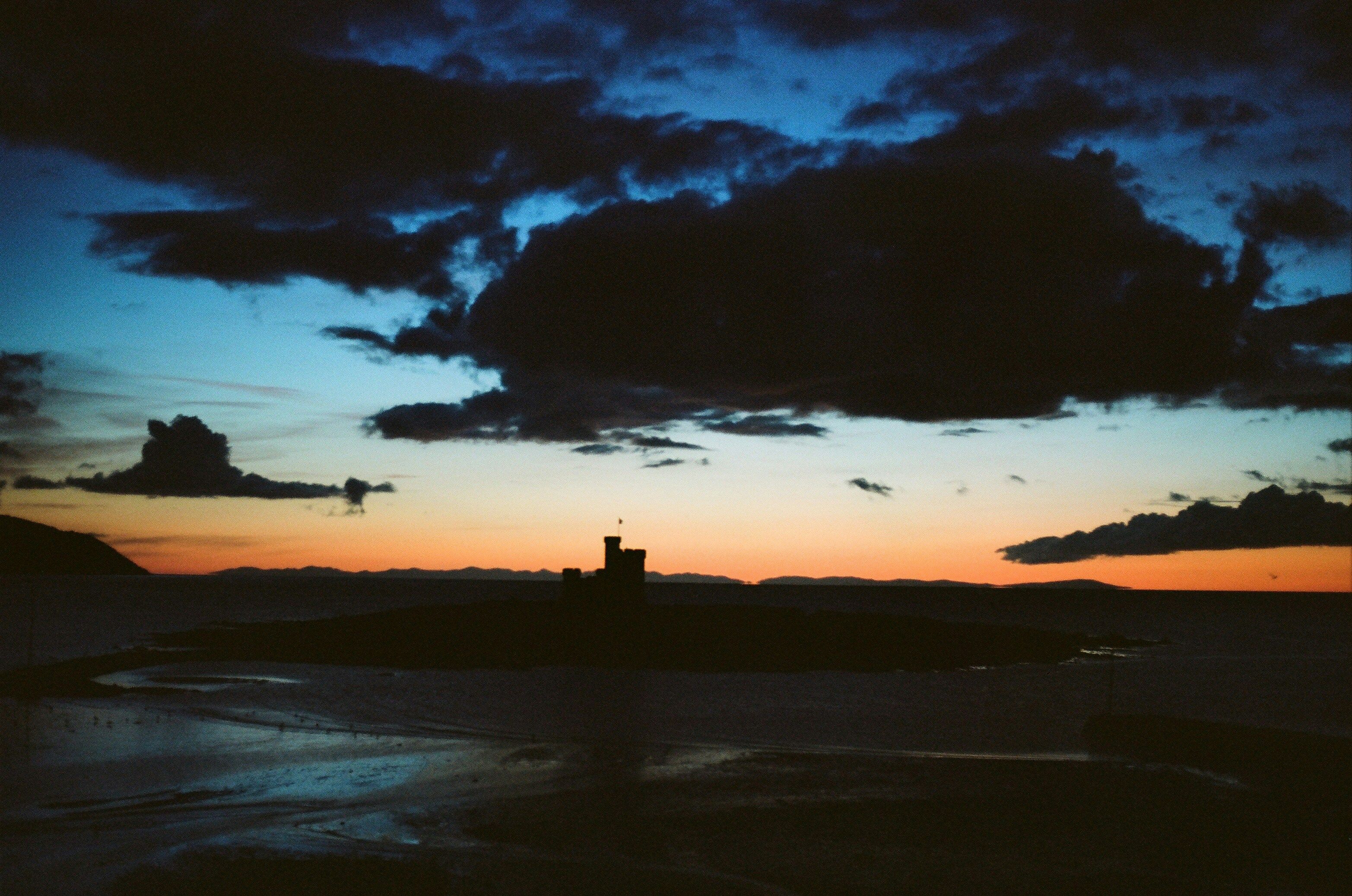 dark sunset over water