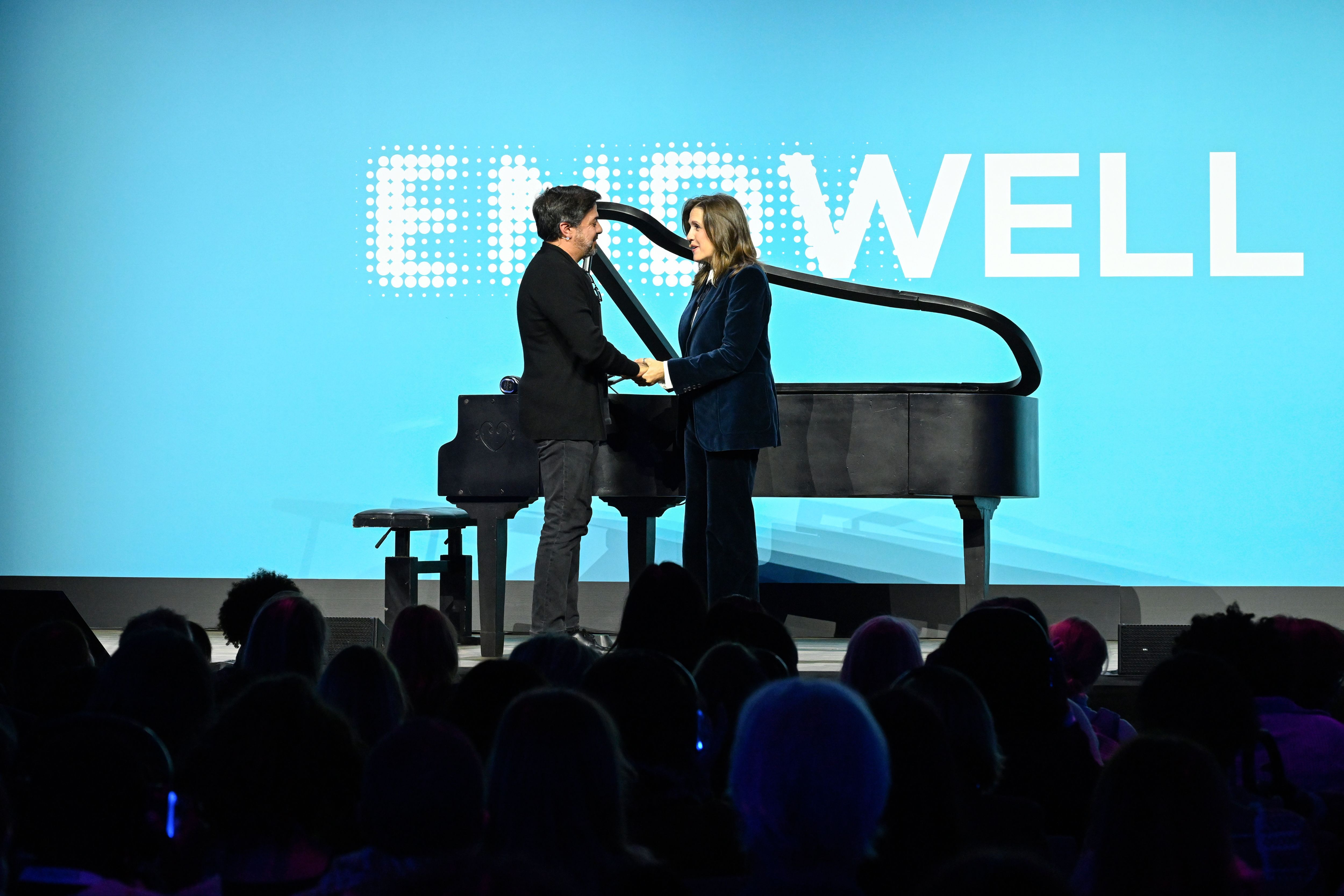 Murray on stage with piano