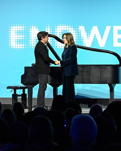 Murray on stage with piano