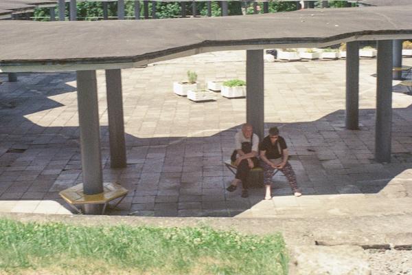people sitting on bench