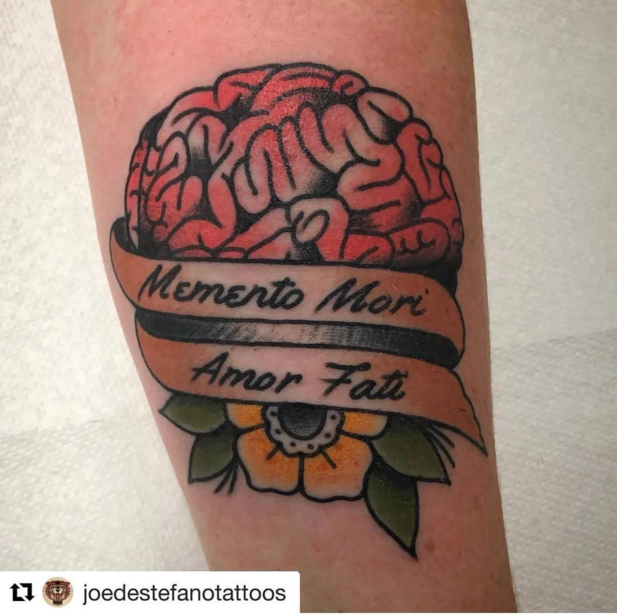 After Molly finished chemotherapy, she got this tattoo. Memento Mori: Remember you must die. Amor Fati: Love your fate.
