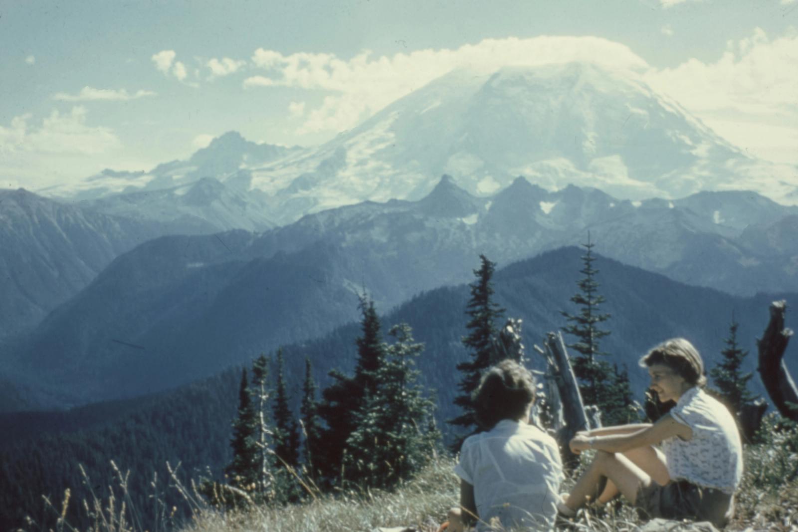 people talking on mountain