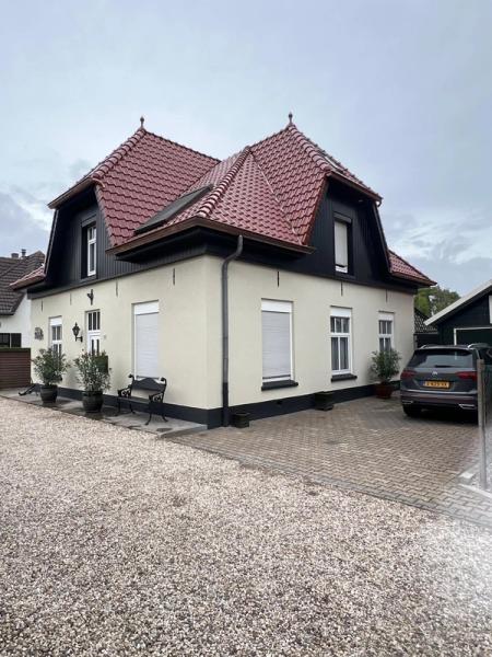 Hellend dak vervanging