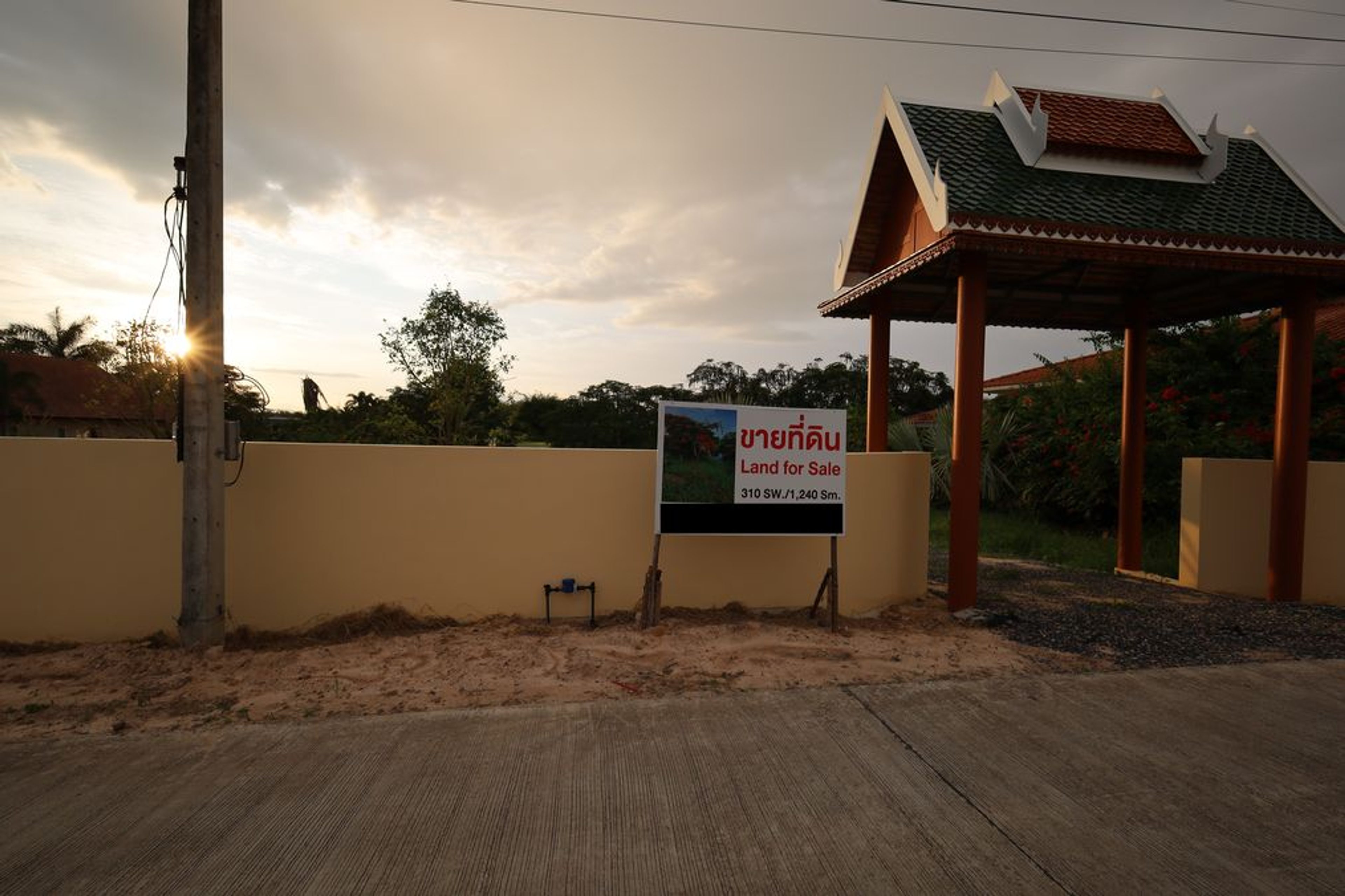 For Sale: 1,240 Sqm Stunning Lakefront Land with Wall and Entrance Arc
