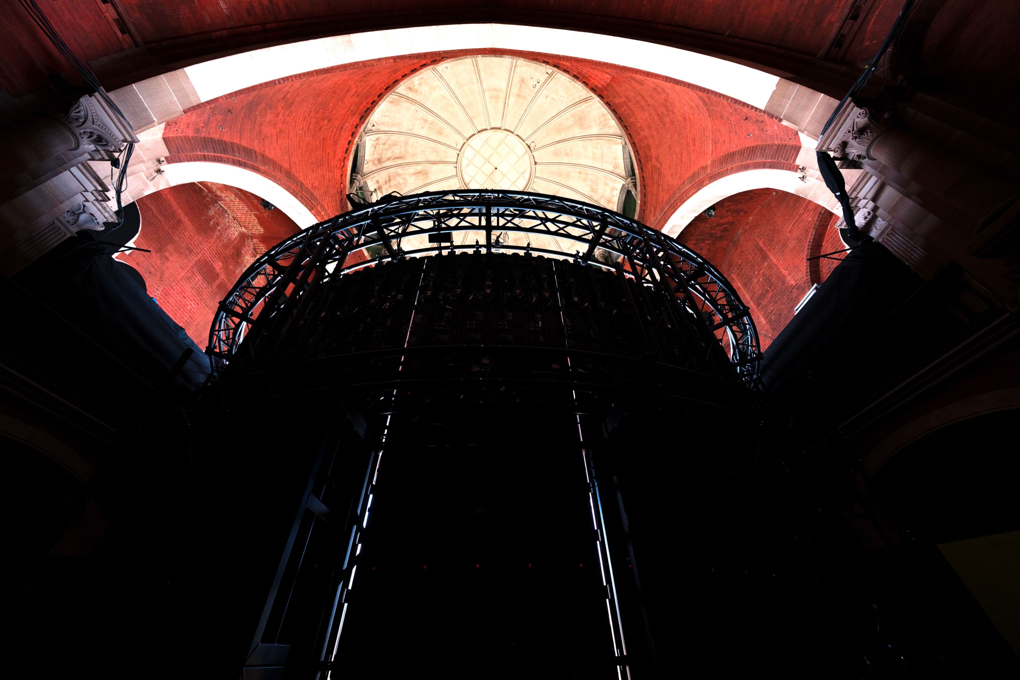 The truss and LED structure of the cylinder seen from below the dome, Wayne McGregor, On The Other Earth, Stone Nest
